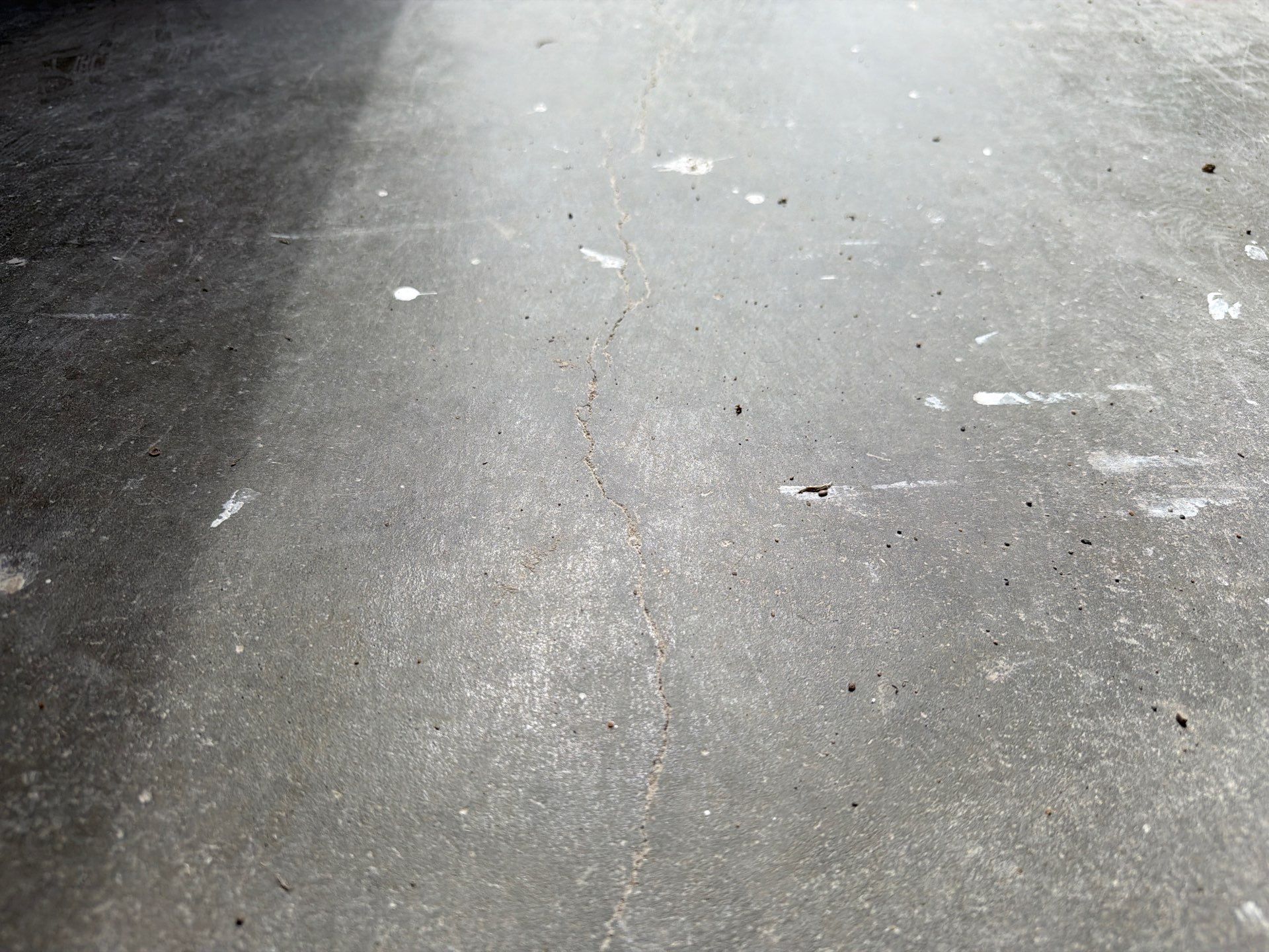 Decorative Chip Concrete Coating Installation in Luverne by Select Painting, Coatings & Garage Cabinets