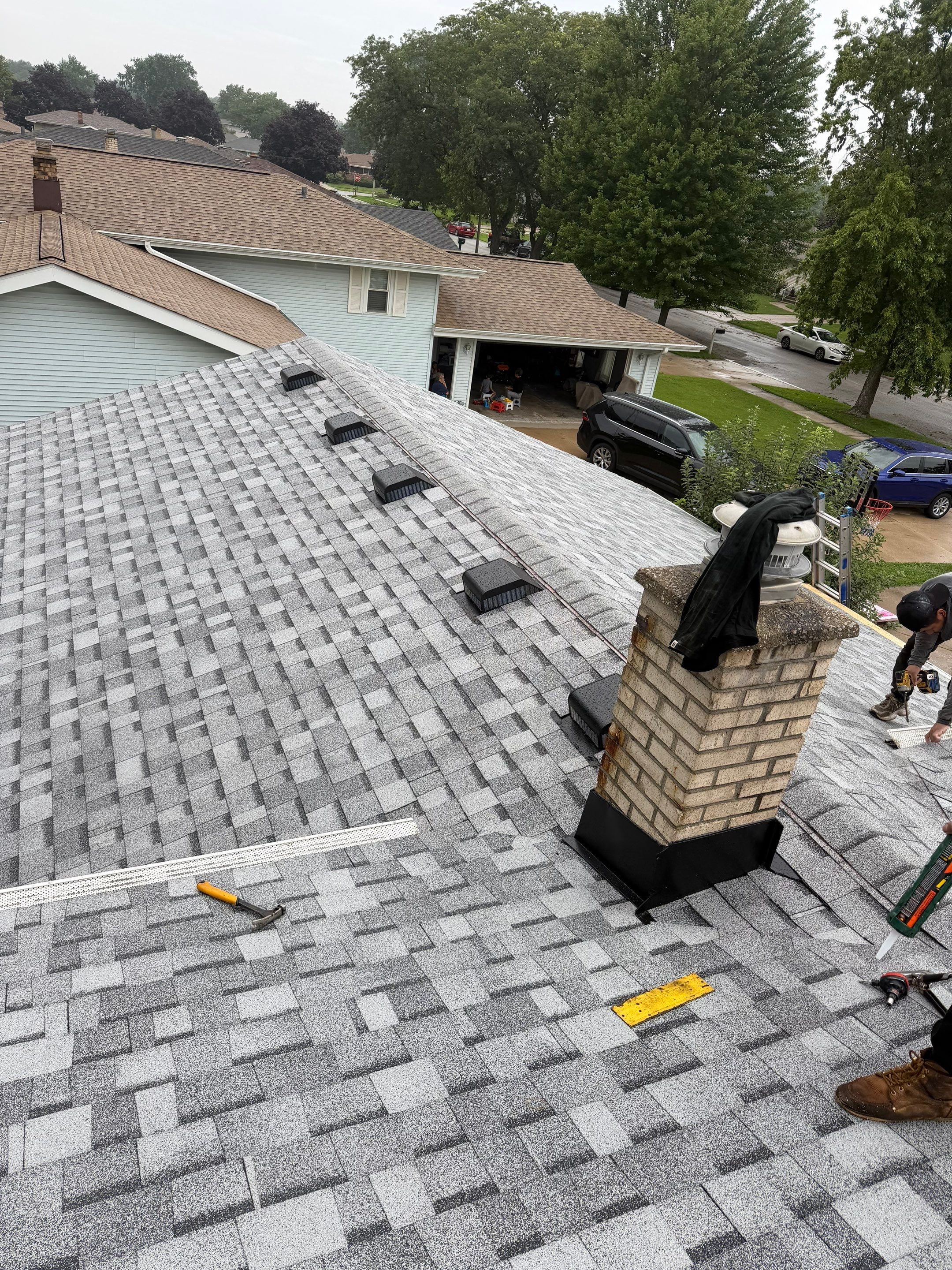 Roofing & gutters by Optimal Home Improvement 