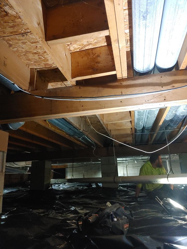 Crawl space encapsulation and Waterproofing using Structural Wood and Steel Reinforcements by Toledo Basement Repair 