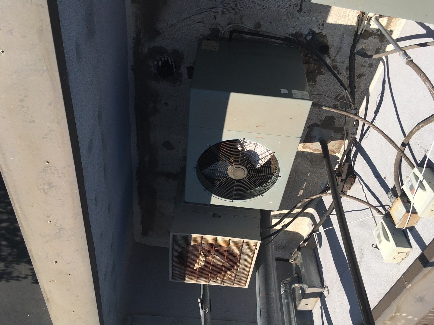Spray foam and coatings inside commercial building HVAC well using Spray foam and coatings over existing BUR system by Straight Edge Roofing Inc
