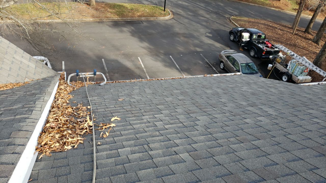 Gutter Cleaning using water by Power Wash Masters LLC