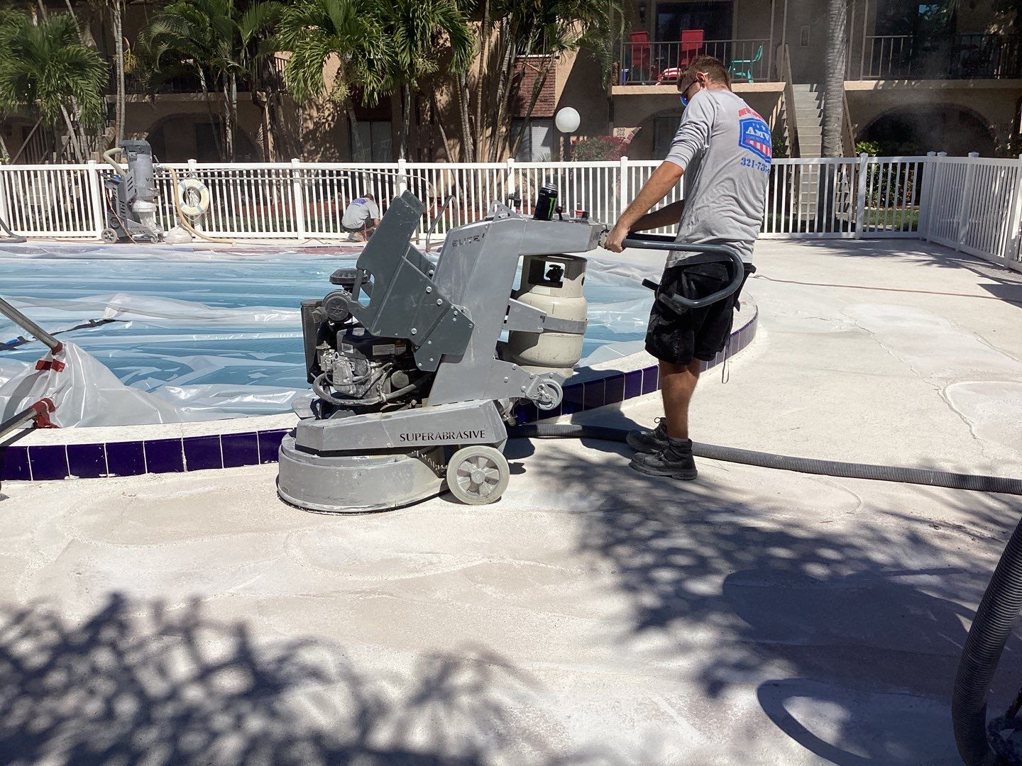 Pool Deck using Orbit and Tidal Wave by Amvet concrete coatings llc