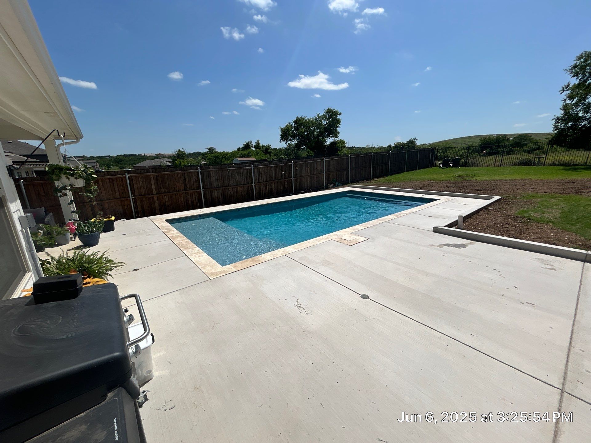 Classic Geometric Pool with Expansive Decking by Pinnacle Pools and Spas - DFW