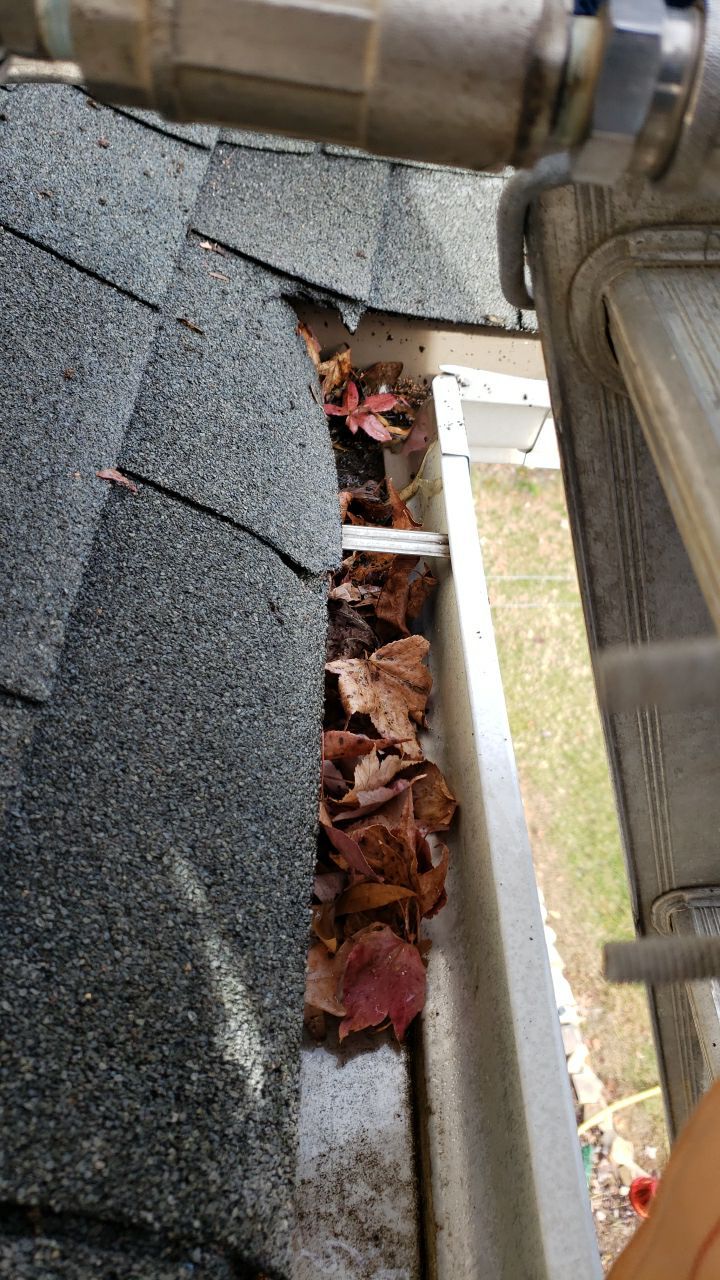 gutters and Driveway by Power Wash Masters LLC