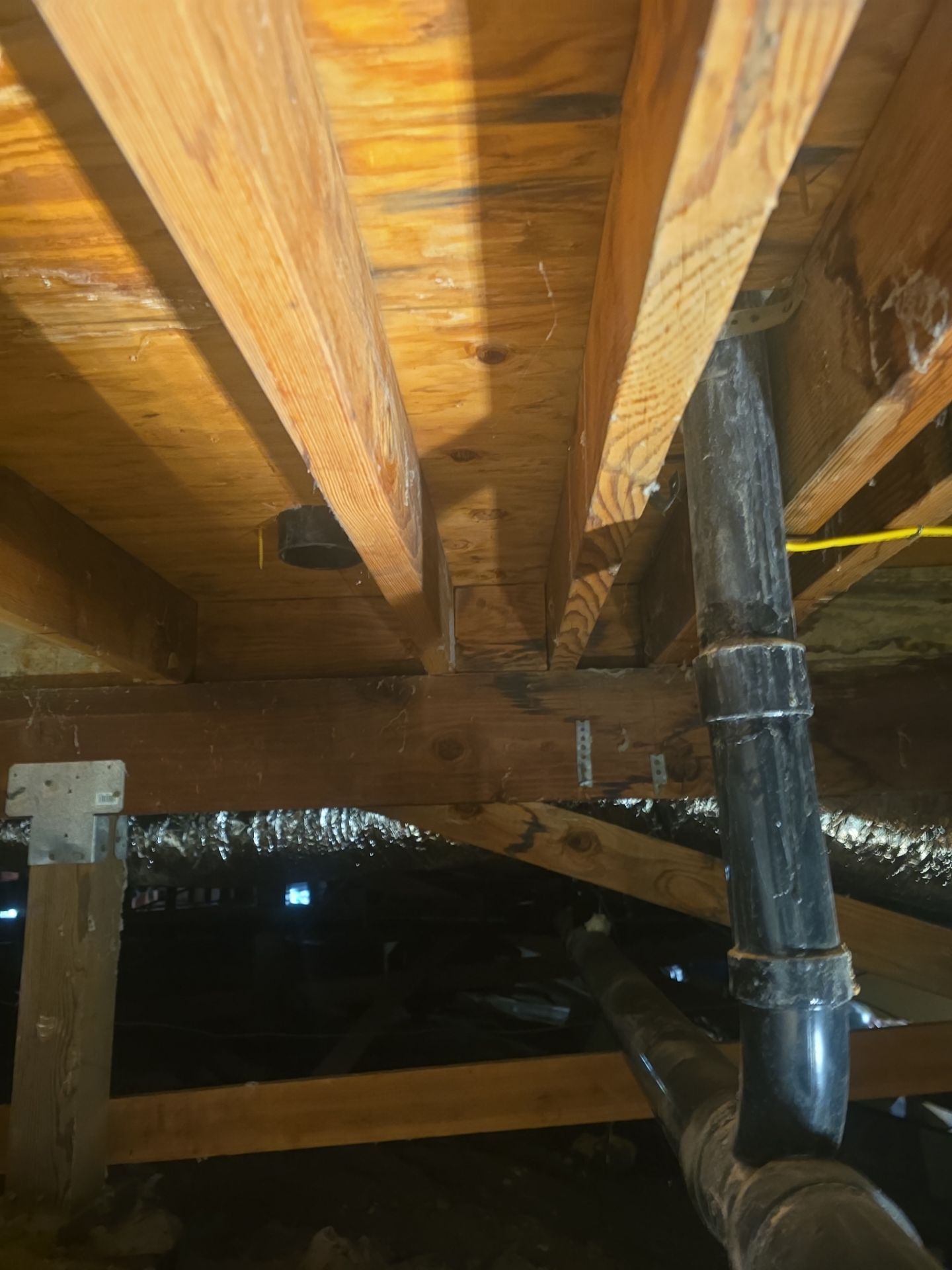 Installation of New Tall Black Piping (Wall to Ceiling) & Underground Piping by Us Plumbing