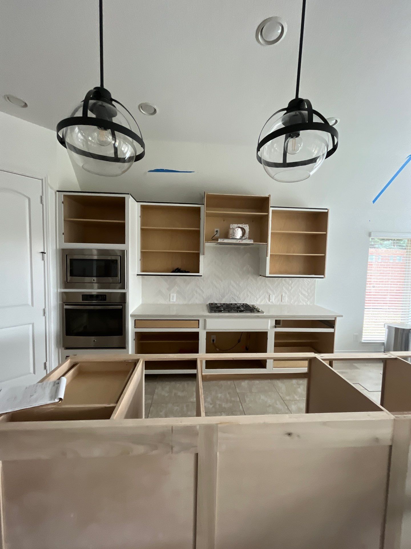 Kitchen Remodel using Water mitigation equipment by L&T General Contractors and Restoration INC