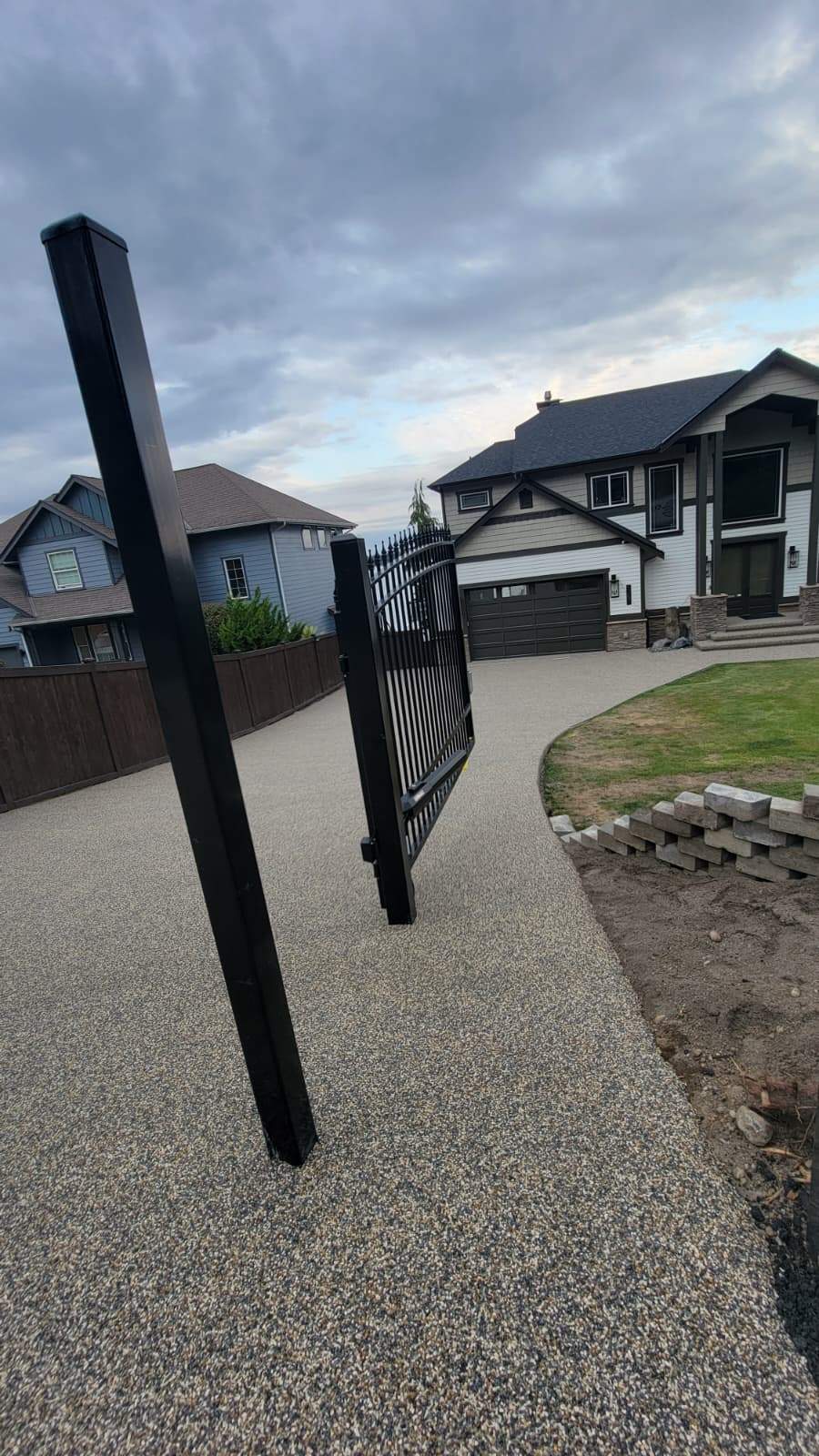 Big Sur Vuba Driveway by Concrete Coating Experts Inc.