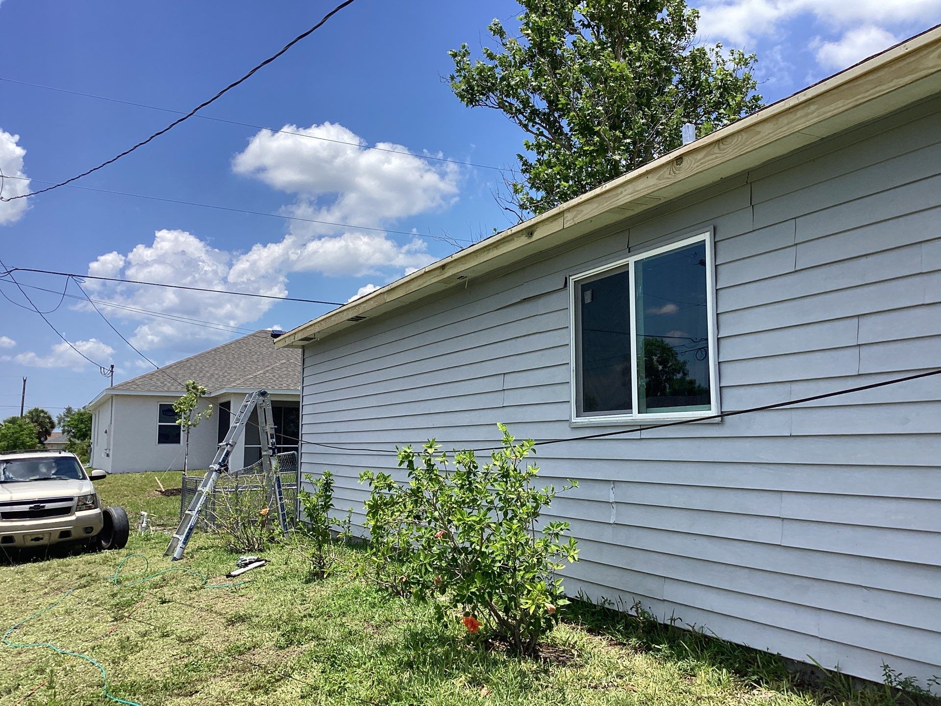 Aluminum Seamless Gutters using Splash Guard in Cape Coral FL by Gutter Professors