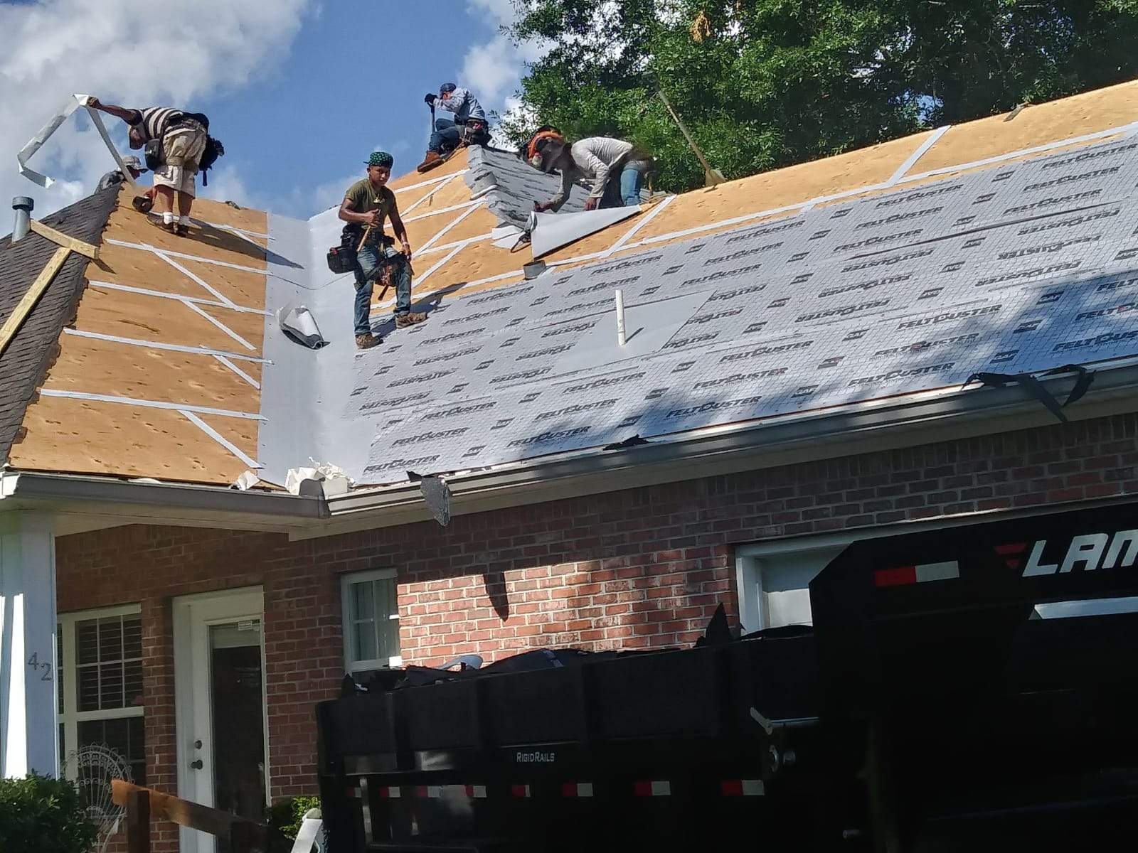 Residential Roofing Installation using Roof Replacement by American Roofing & Construction LLC