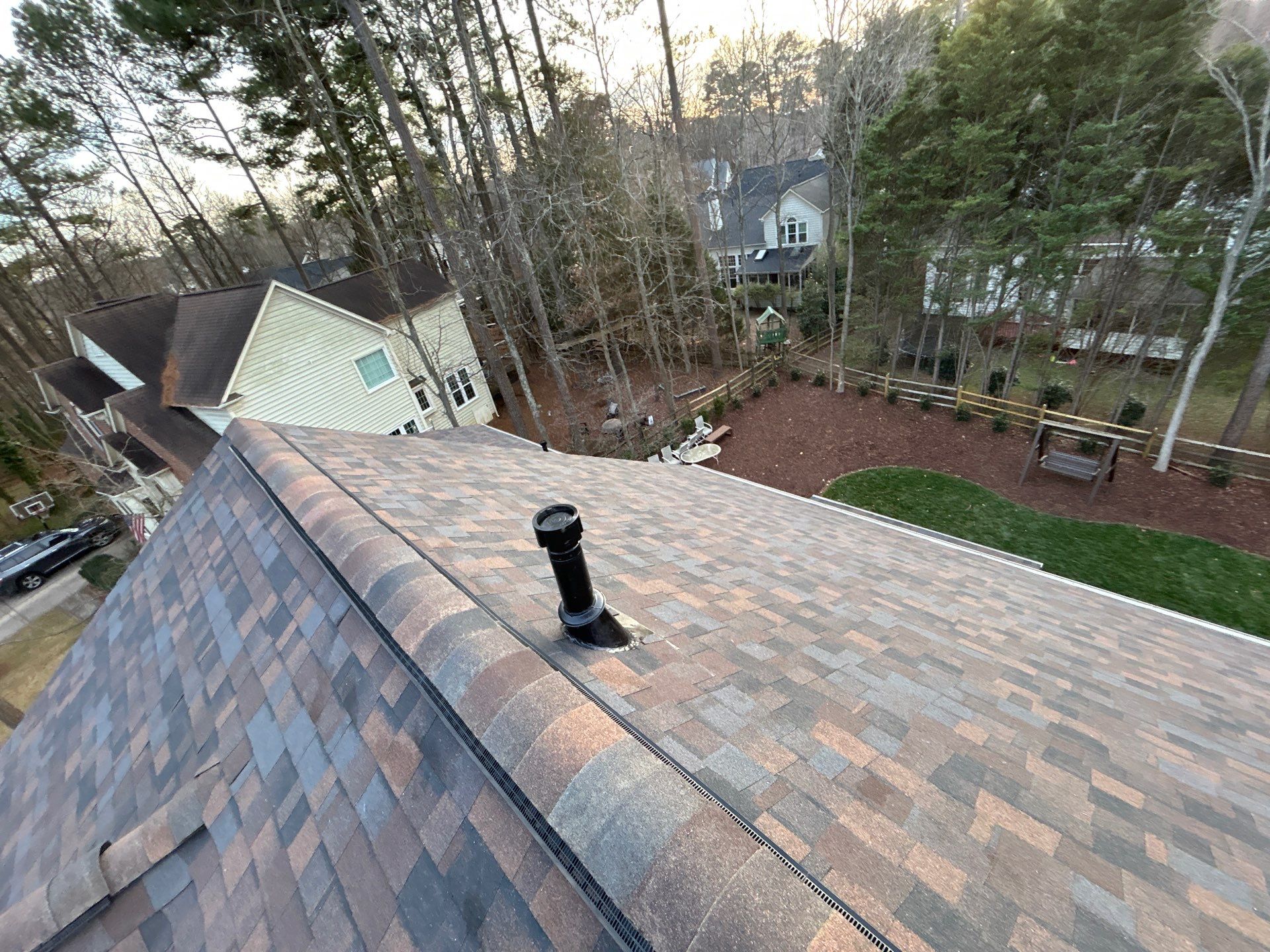 Owens Corning Duration Shingle Roof Replacement and Velux Skylight Installation in Charlotte by Merritt Roofing LLC