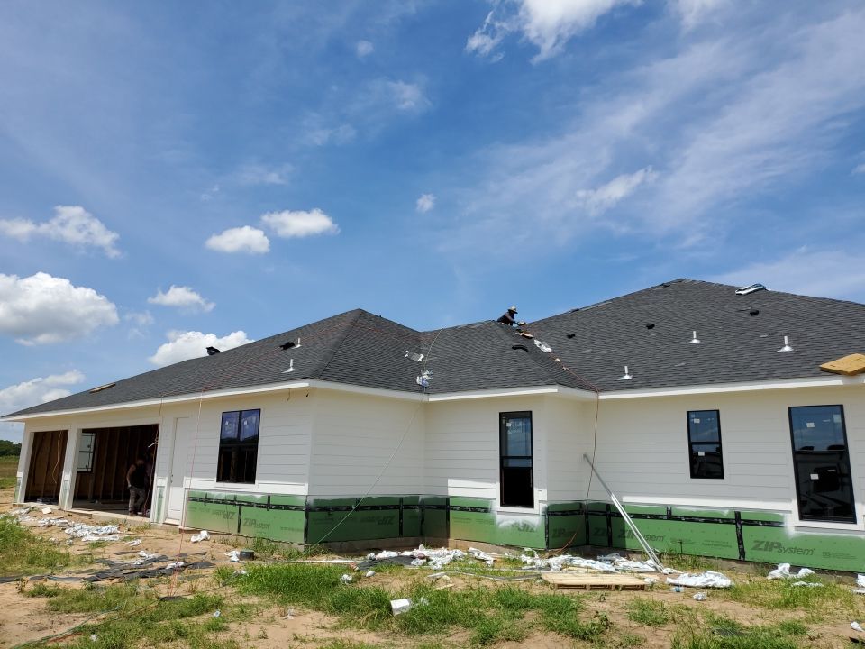 Residential Roofing Installation  by Harvey Roofing & Construction