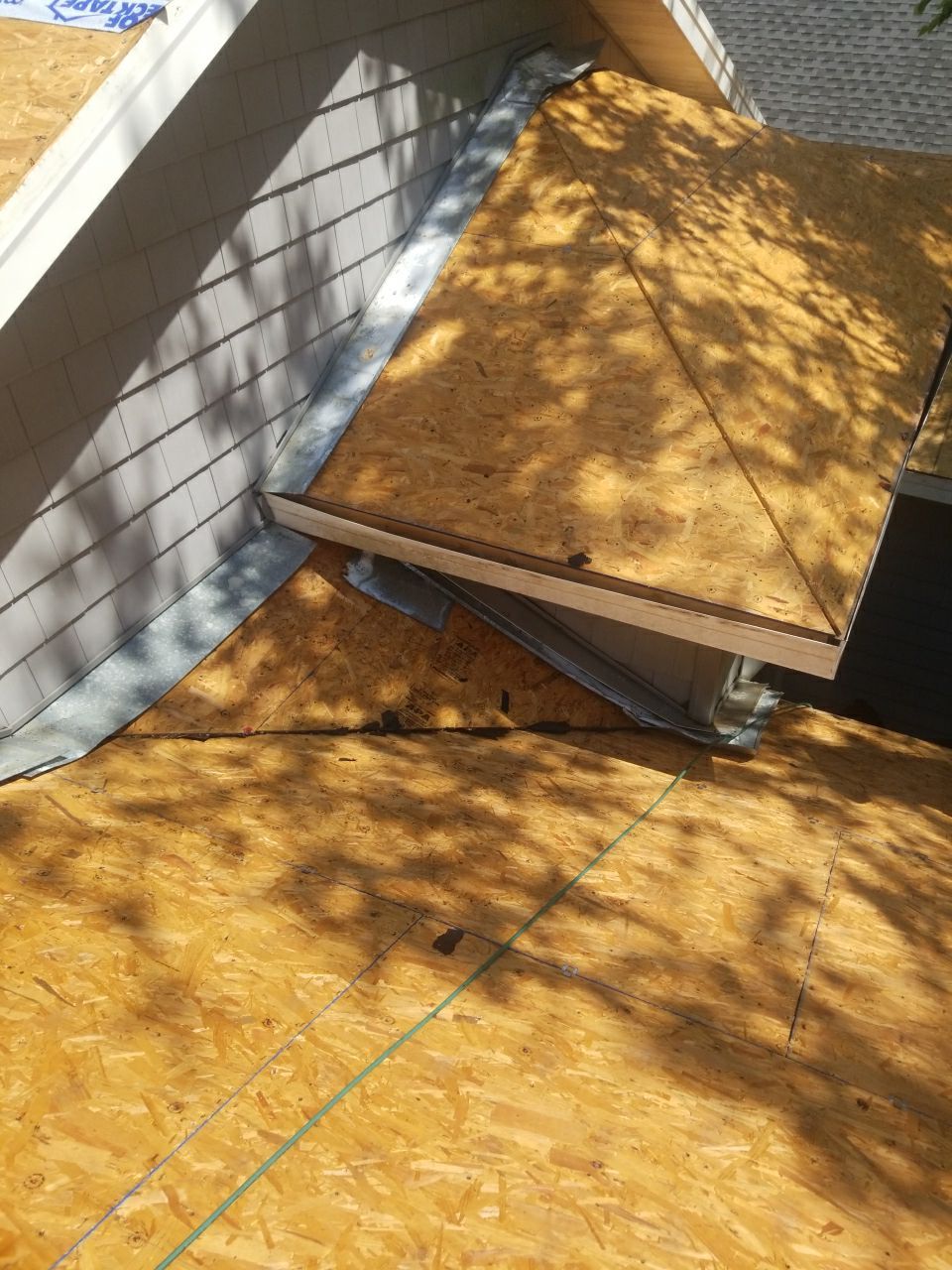 Residential Roofing Installation using Roof Replacement by American Roofing & Construction LLC