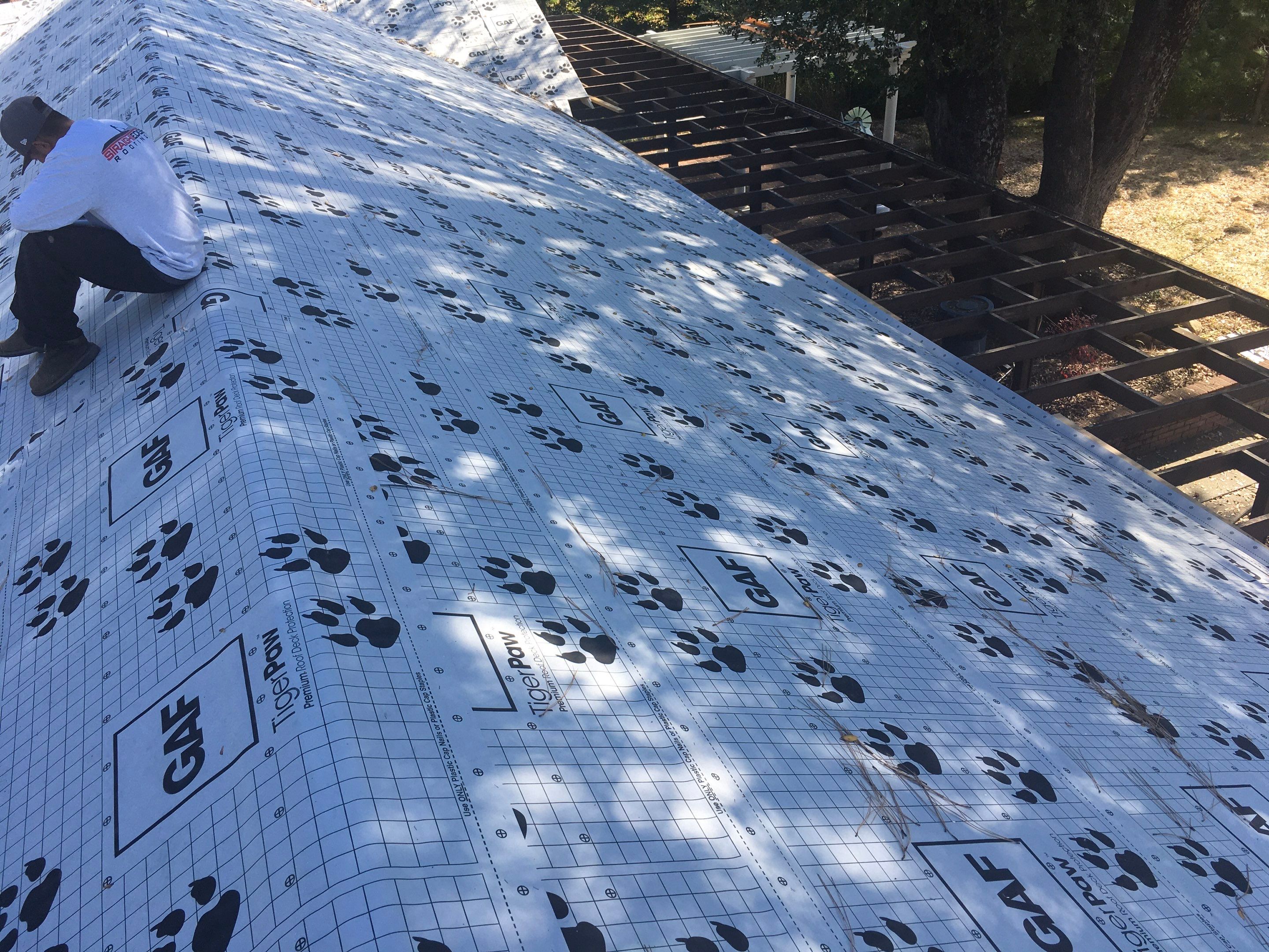 Metal roofing installation using Standing seam metal roofing system by Straight Edge Roofing Inc