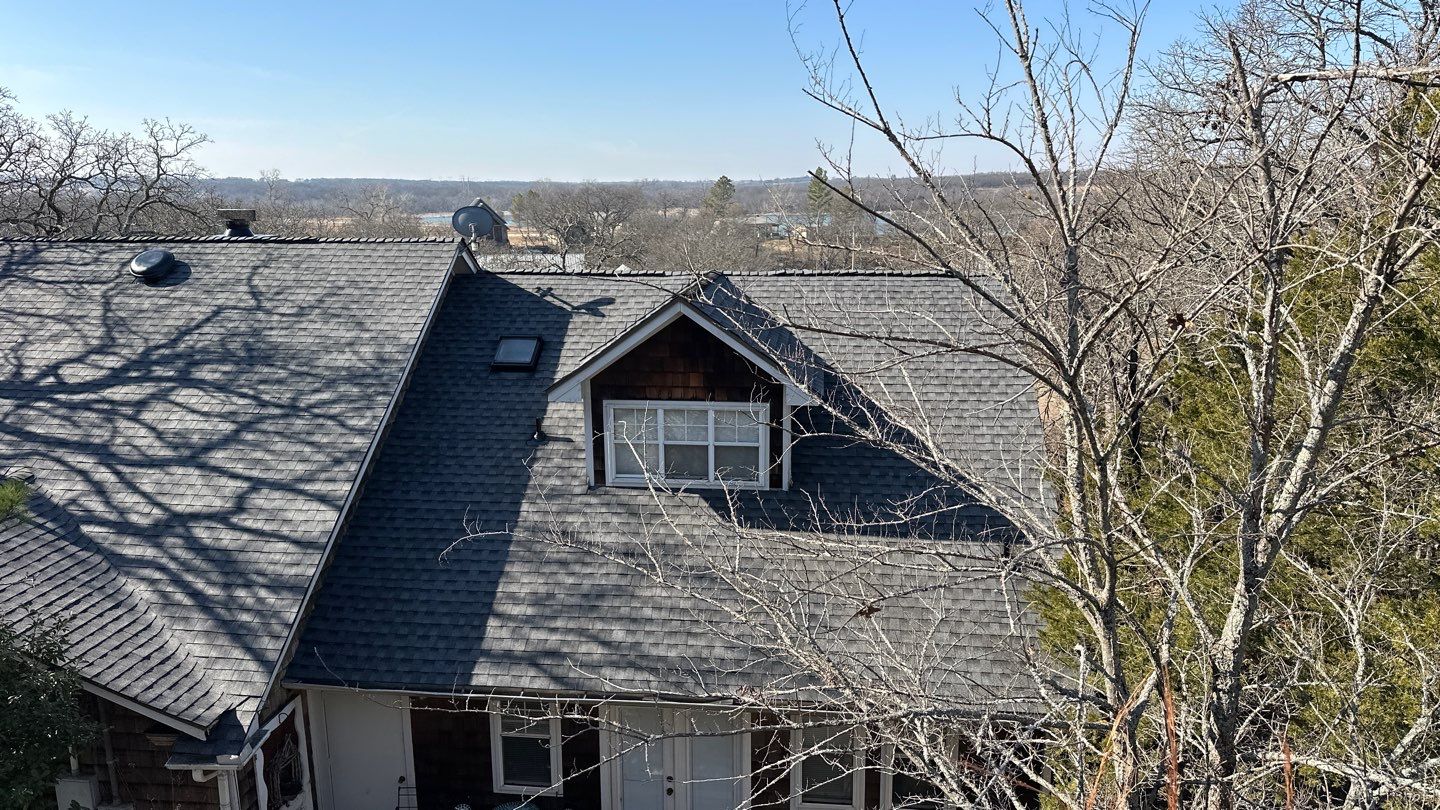 Roof Replacement on a private lake near Ardmore by BANA Roofing and Solar Supply