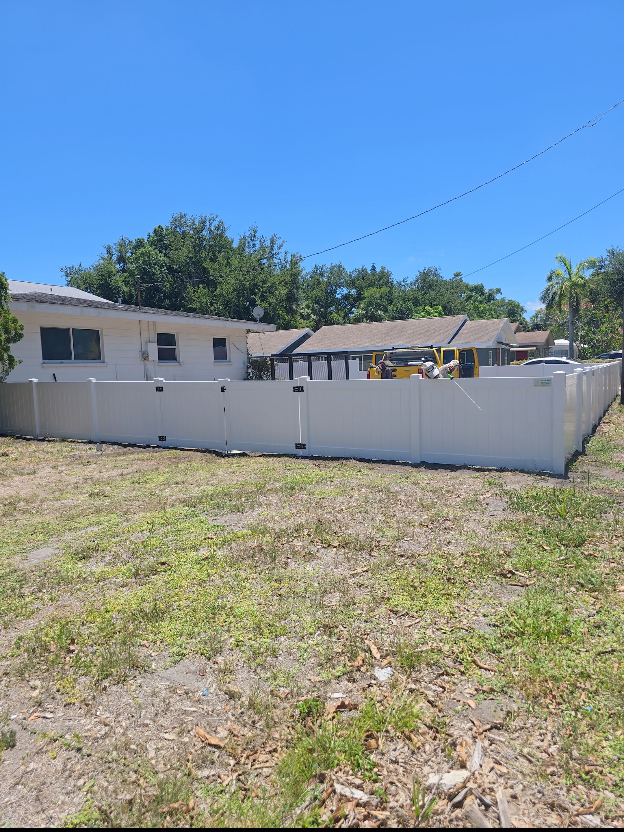 White Vinyl Privacy Fence and Gate Installation in Bradenton by True Fence LLC
