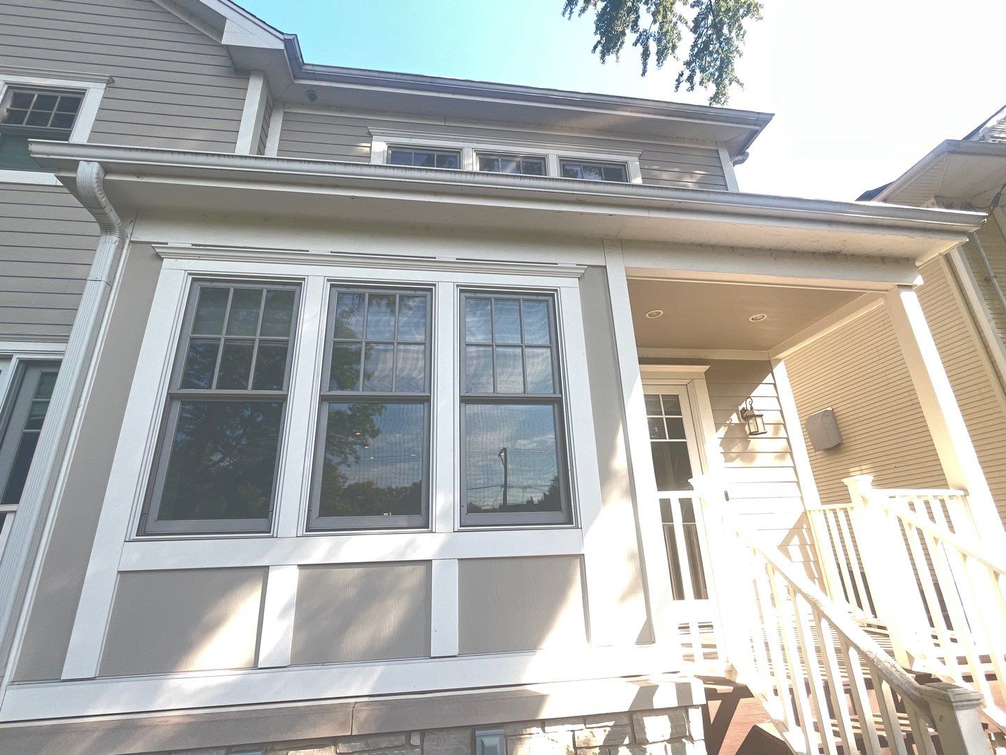 Hardie Board House & Detached Garage Soft Washing by Northern Power Washing LLC.