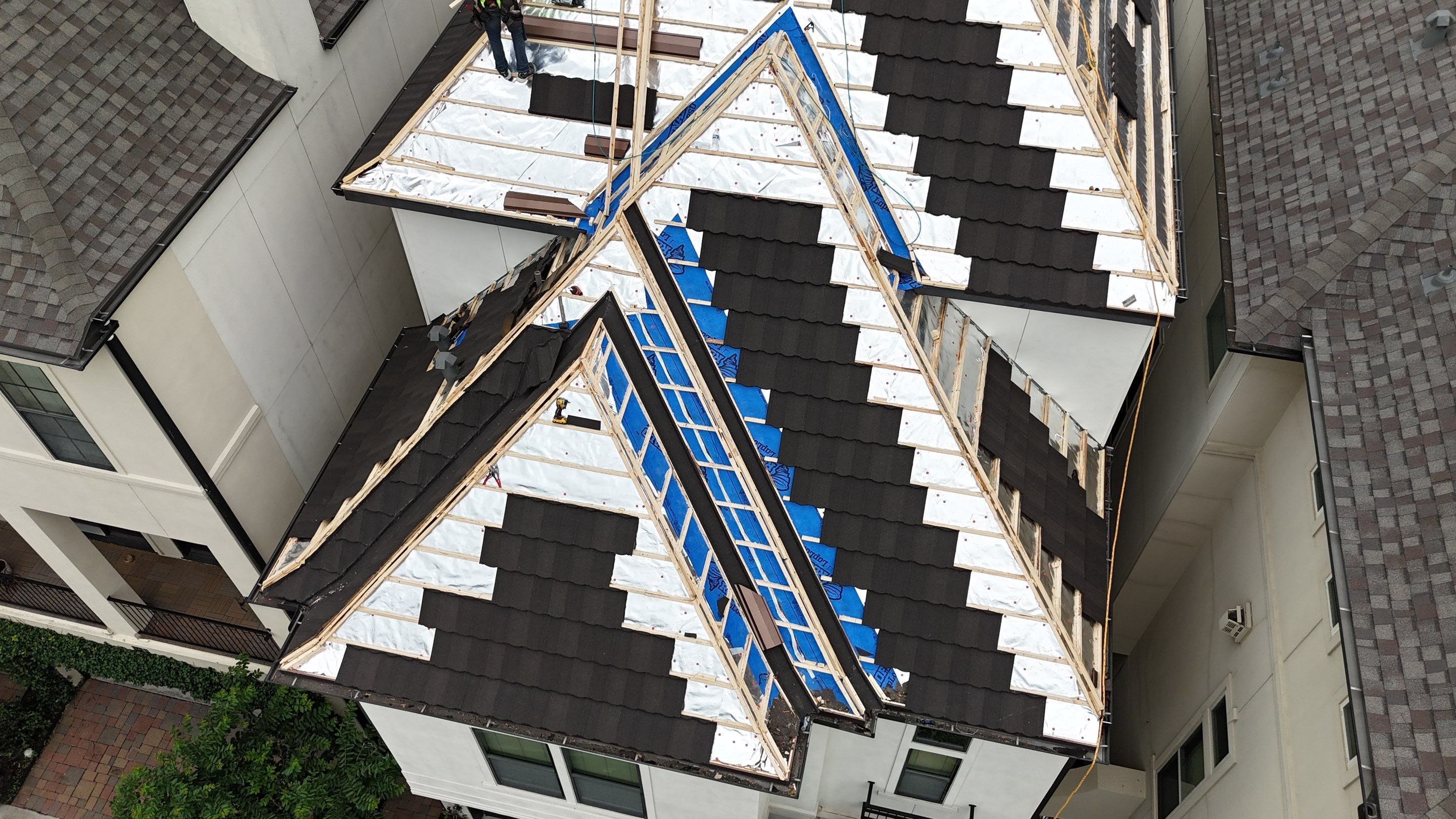 Stunning transformation from Shingles to DECRA Tile by Core Four Roofing