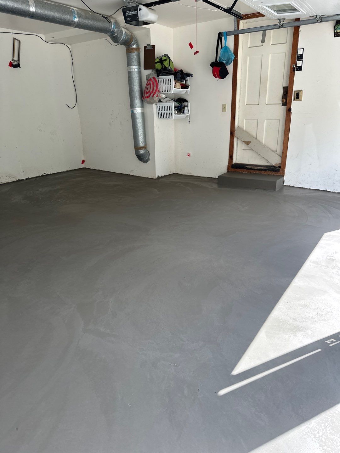 Concrete garage floor replacement   by NG Masonry & Construction LLC