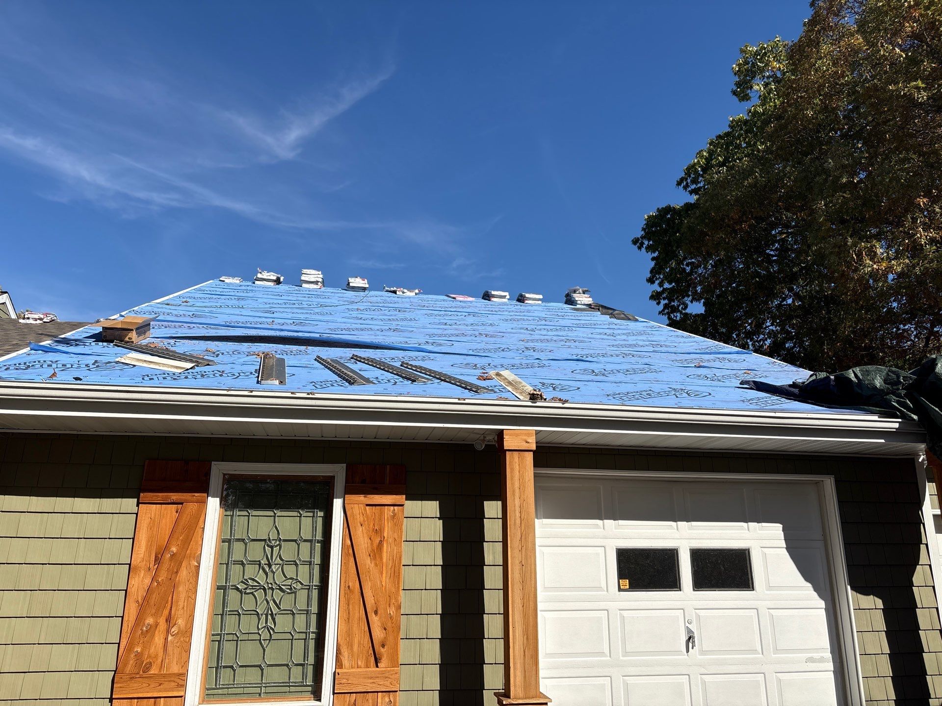 Residential Roof + Gutters & Downspouts & Gutter Guards Install  by Titan Commercial & Residential Roofing 