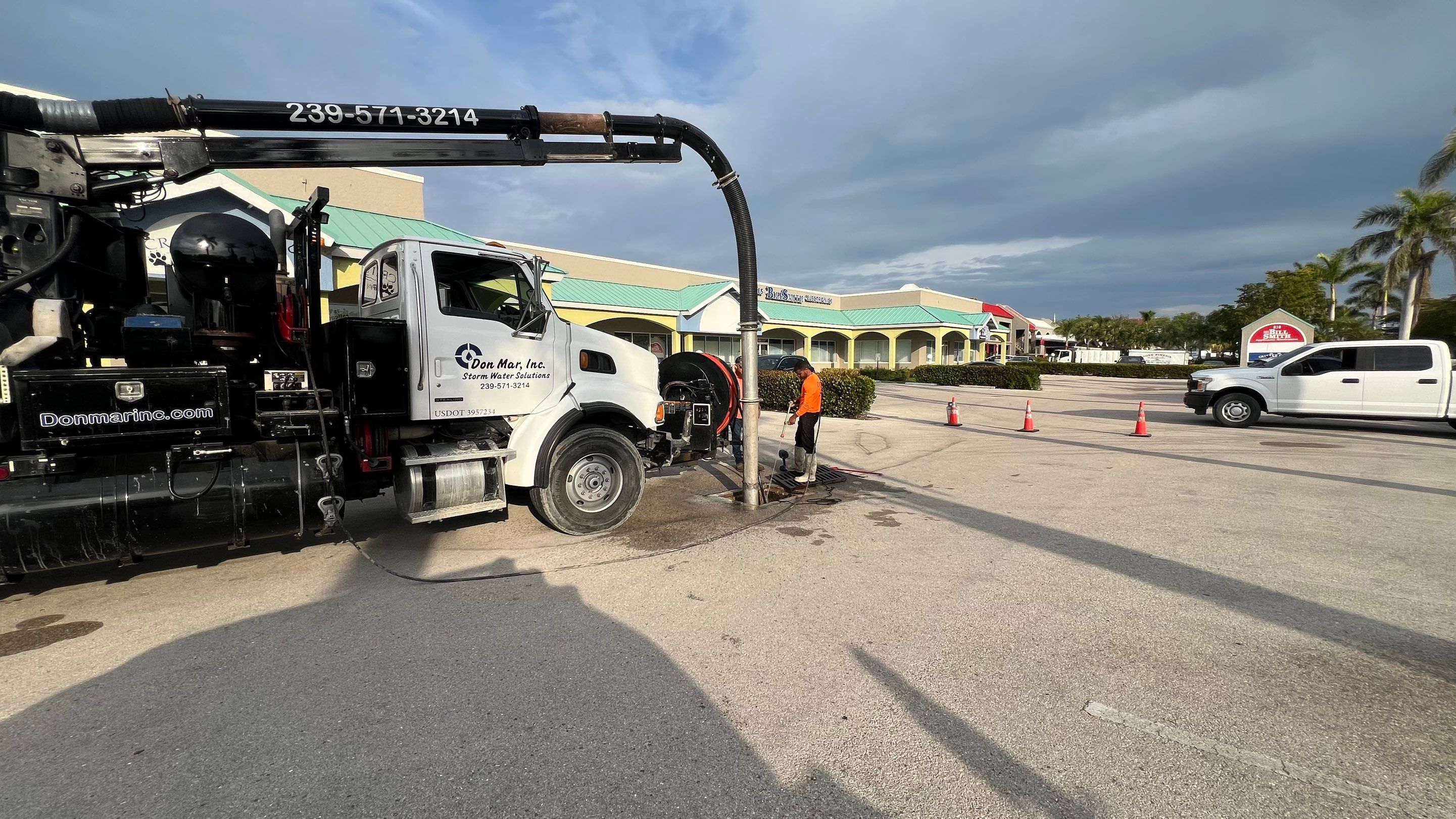 Stromwater System Maintenance at Bill Smith Appliances / Critter Cafe Marco Island Catch Basin by Don Mar, Inc. Storm Water Solutions