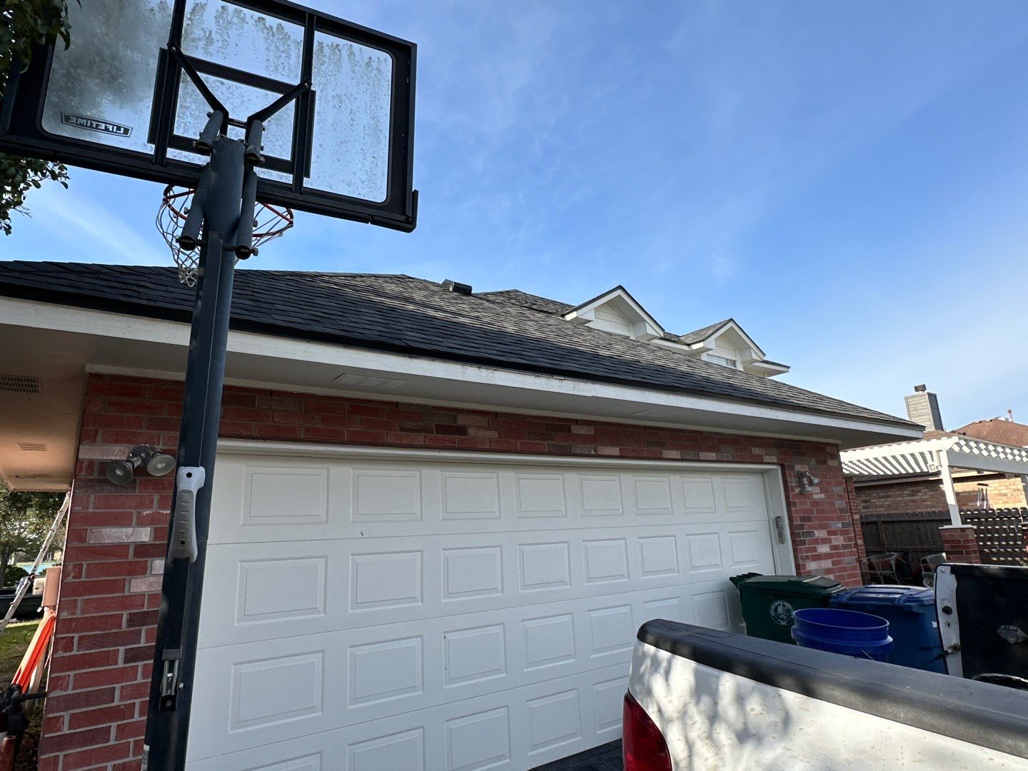 Residential Roofing Installation using Certainteed Landmark Moire Black by Galvan Roofing and Construction