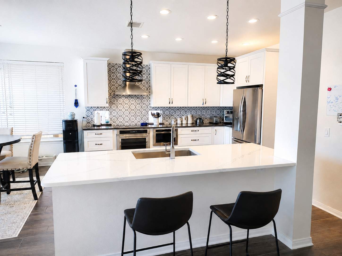 Stone Oak San Antonio Kitchen Remodel Featuring Custom White Cabinetry & Expanded Island by Legacy Bath and Kitchen 