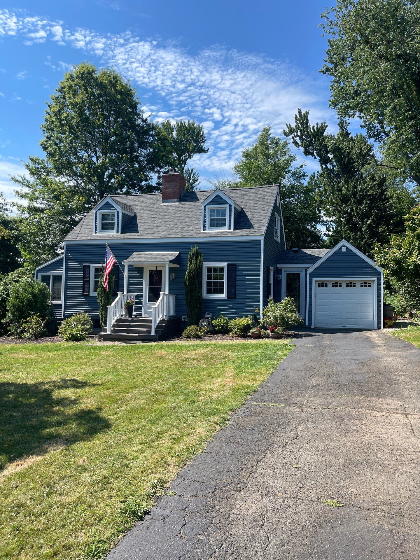 Complete Exterior Estate gray with Pacific Blue Siding by A Plus Exterior