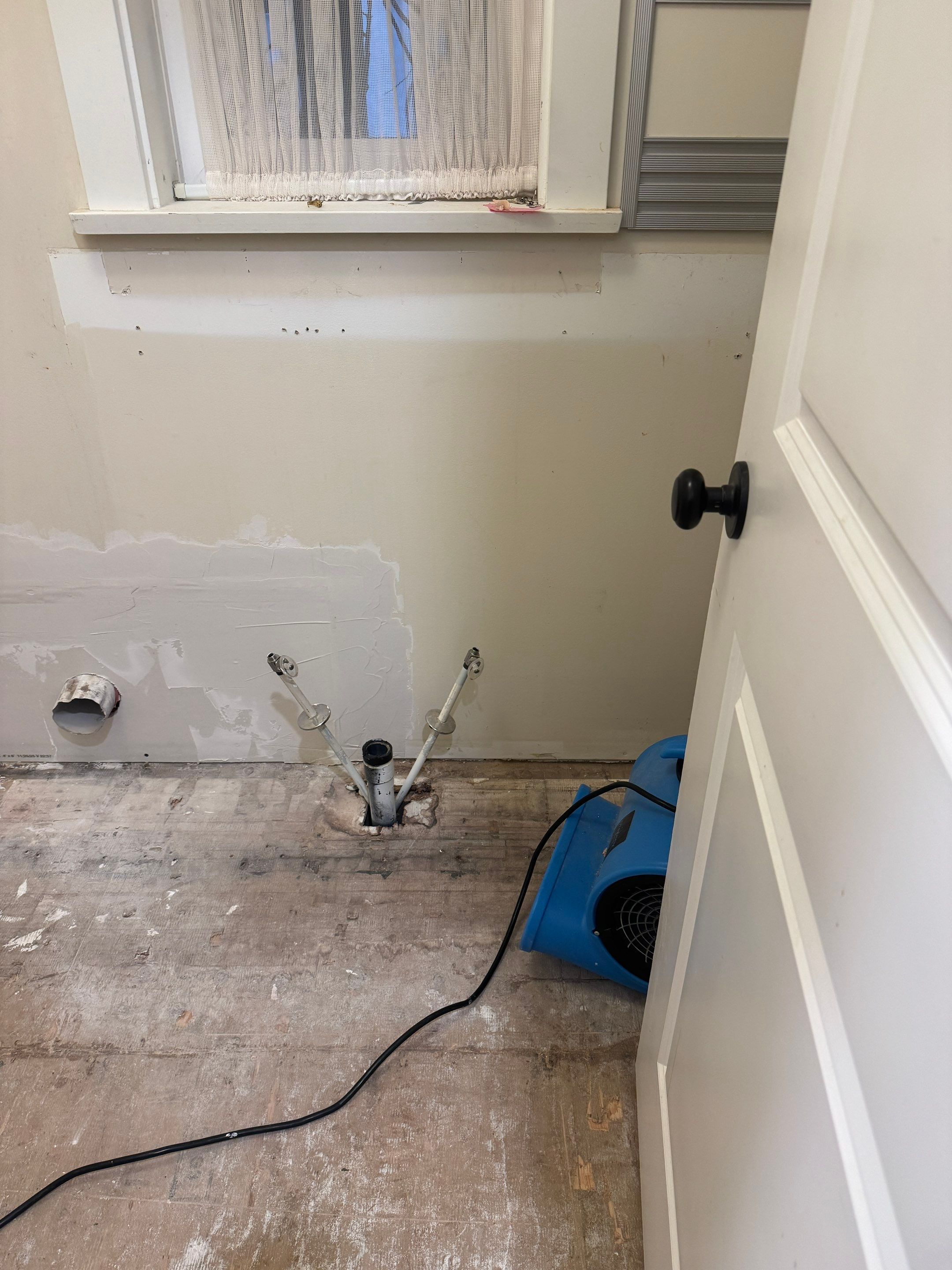 High-End Laundry Room Renovation and Restoration in Vancouver by YVR Construction Group