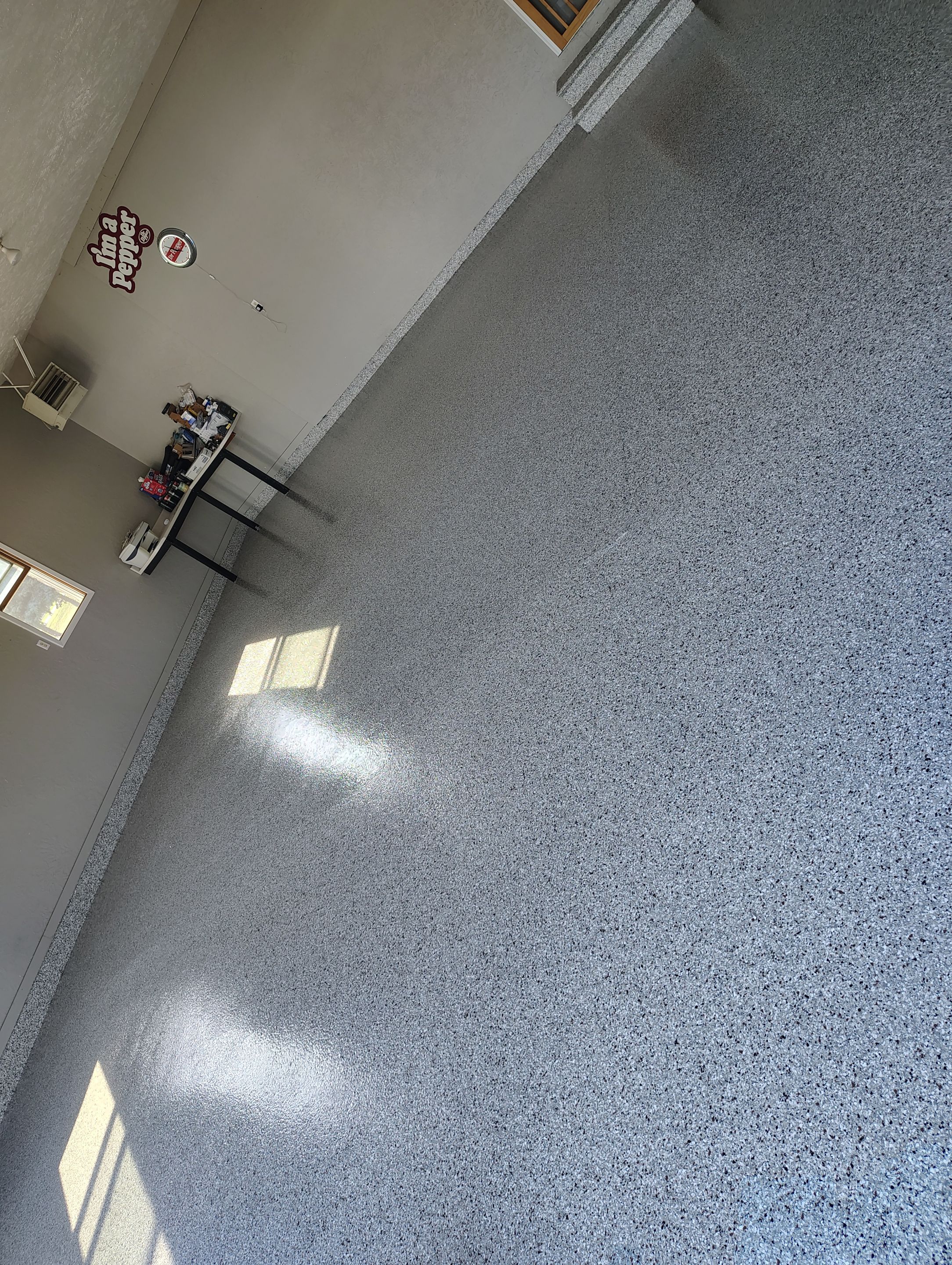 Garage Concrete Floor Coating and Crack Repair in Onawa by Select Painting, Coatings & Garage Cabinets