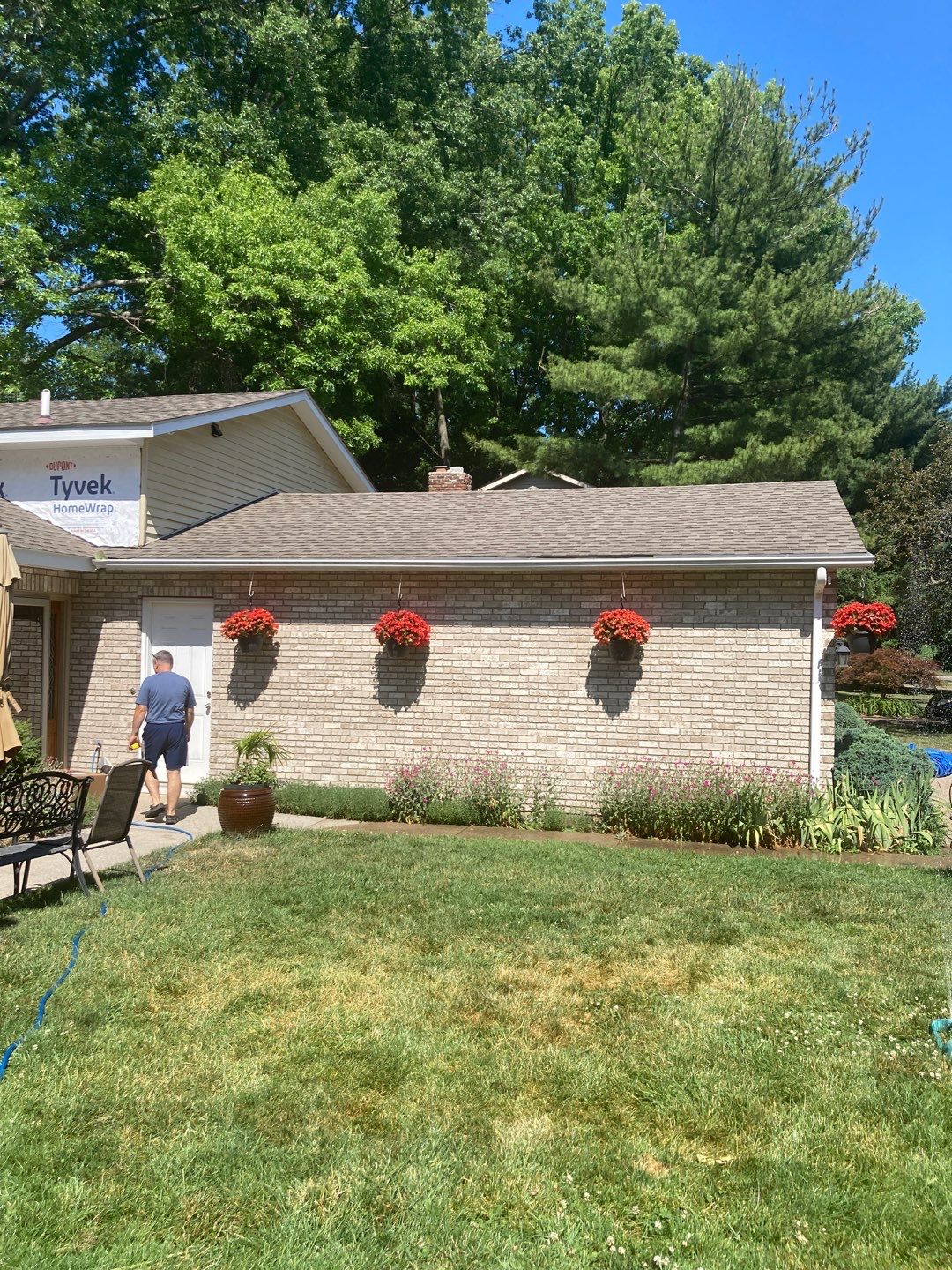 Gutter Installation using 5" Seamless Aluminum Gutters by Absolute Roofing and Construction