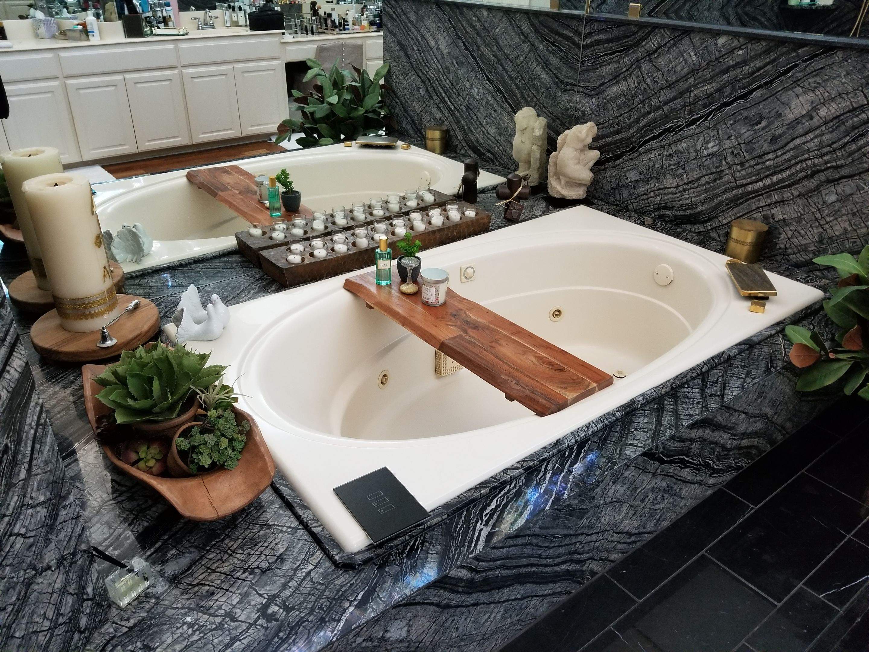 Bookmatched Natural Stone Shower by Legacy Bath and Kitchen 