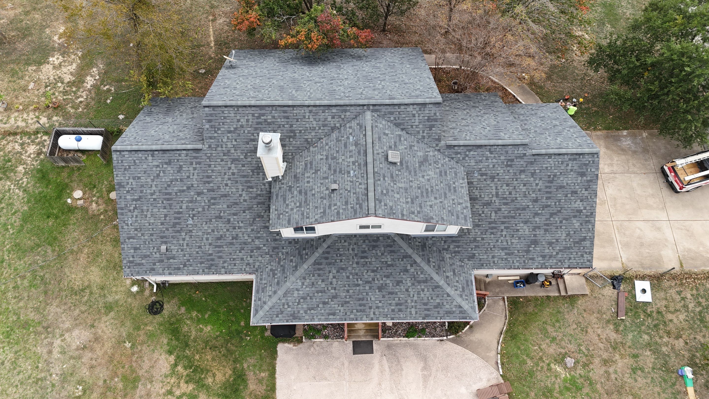 Residential Roof Replacement using Owens Corning - Oakridge - Estate Grey by Action Exteriors Austin