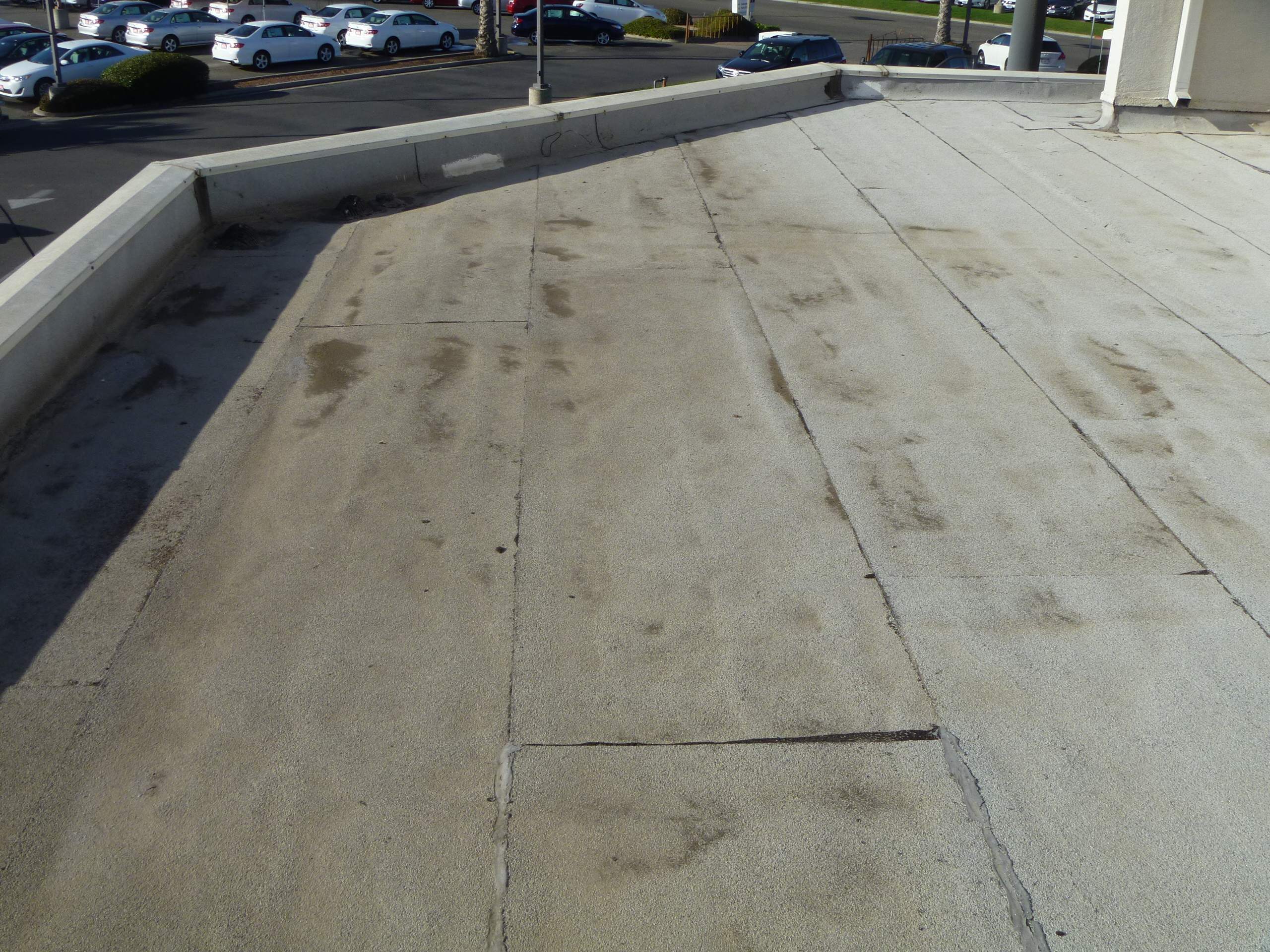 Commercial Roofing Installation using Spray foam and Conklin Benchmark/PUMA XL 18 yr warranty coatings by Straight Edge Roofing Inc