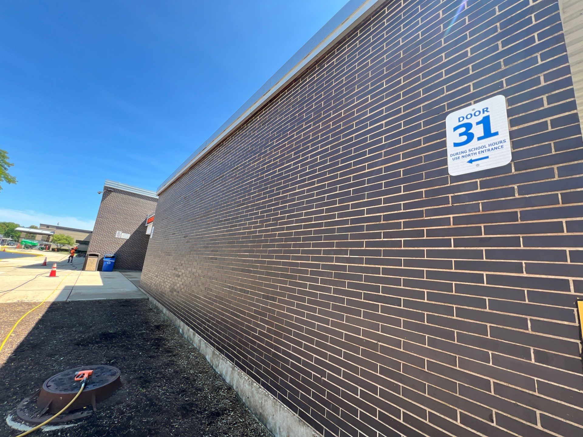 commercial pressure washing using Algaecide, soft wash soap by Northern Power Washing LLC.