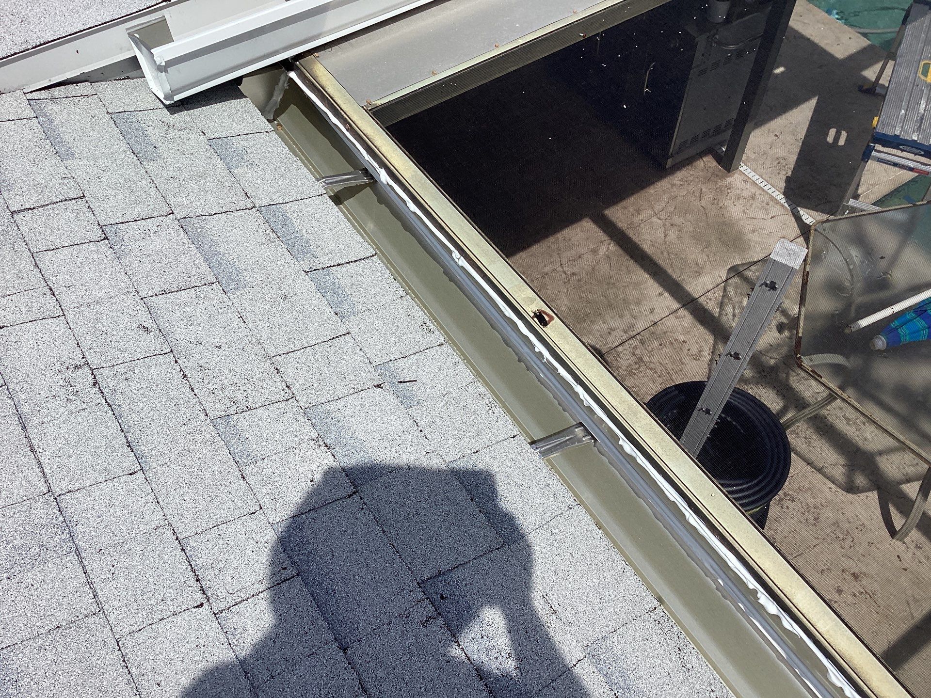 White Seamless Gutters and Splash Guards in Fort Myers FL by Gutter Professor by Gutter Professors