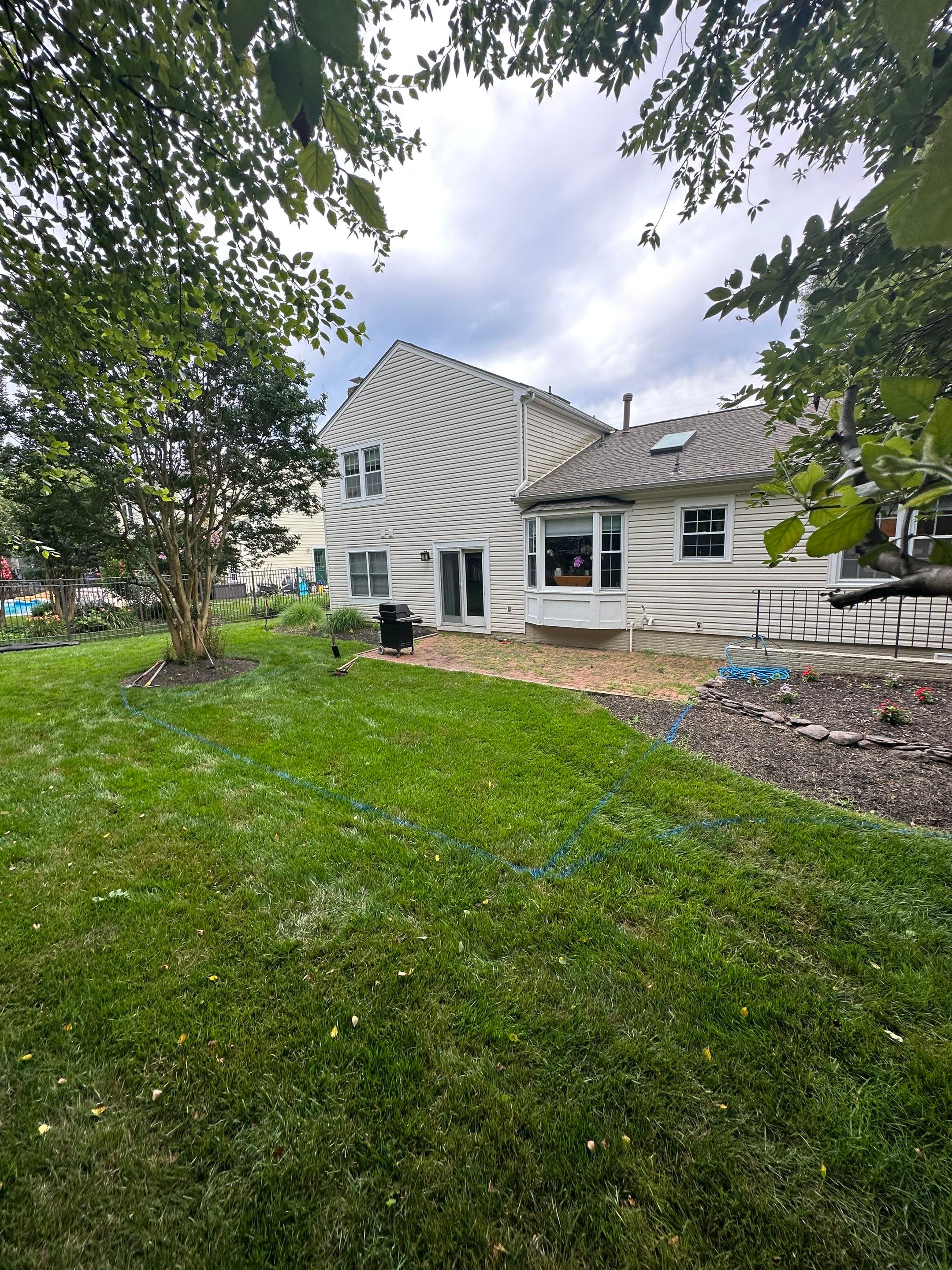 Backyard Transformation using Techo-Bloc Pavers by The Smet Companies, LLC
