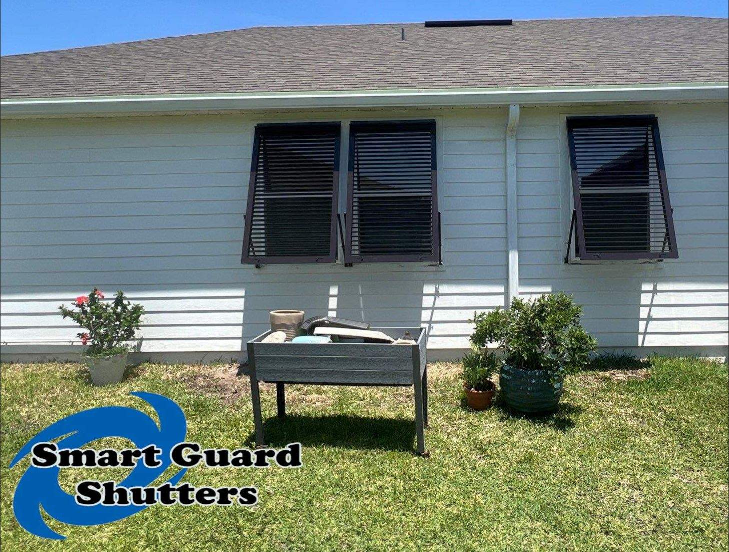 Impact Bahamas In Grey Brown by Smart Guard Shutters