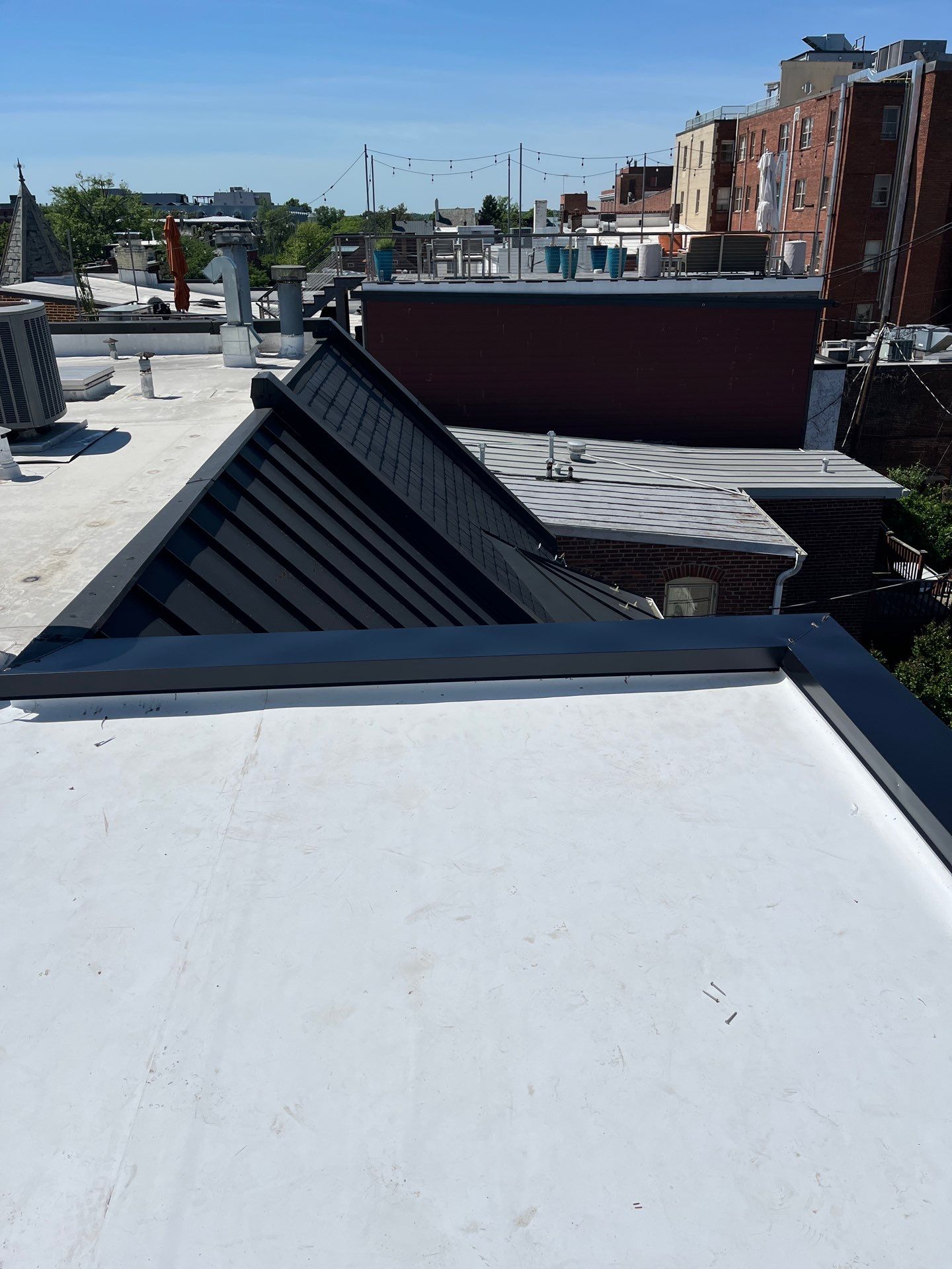 Alexandria: Carlisle Syntec TPO Flat Roof Installation by RM Banning, Inc.