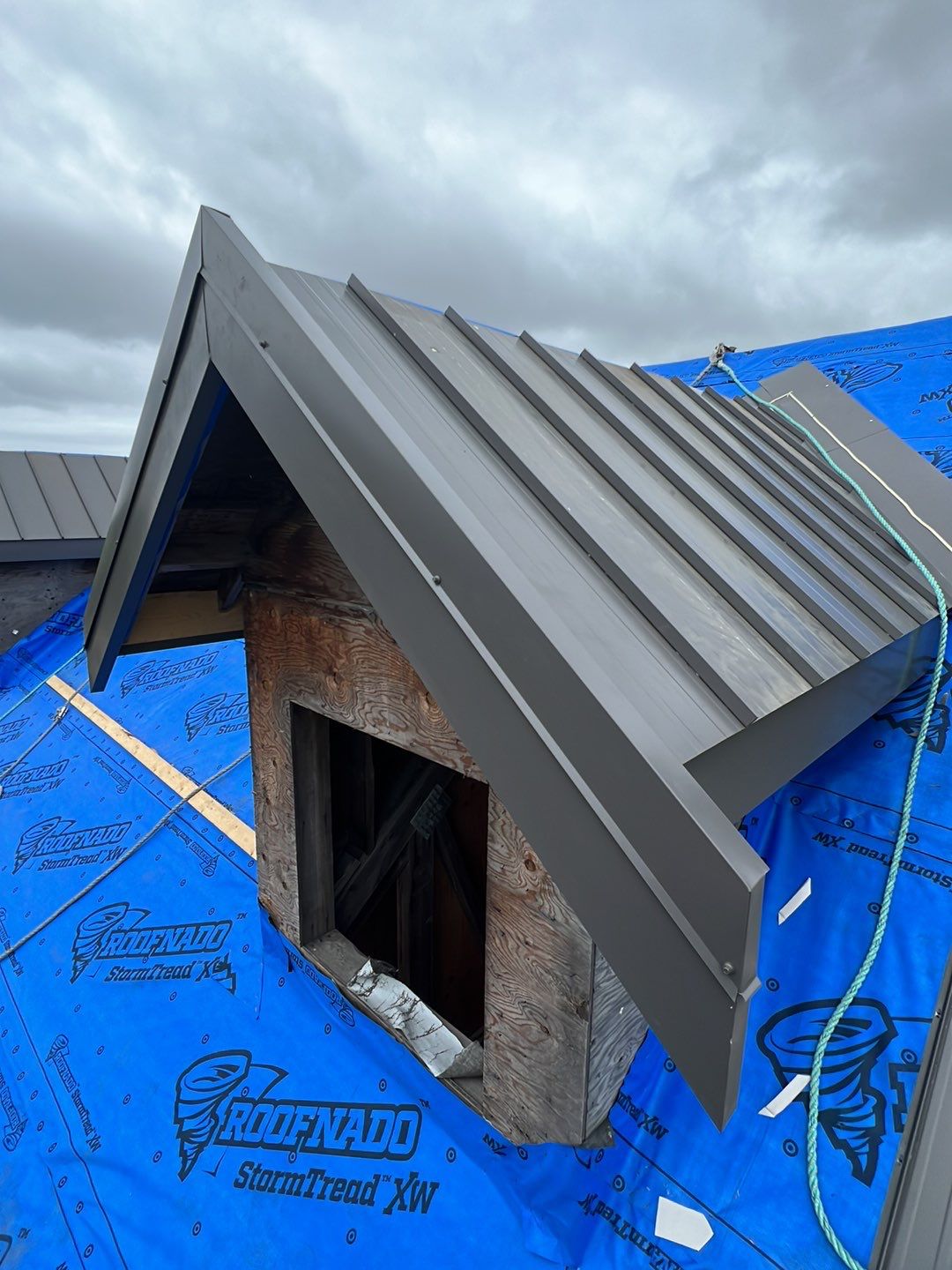 Agricultural Roofing Installation using 12" Prolok metal  by Top Notch Roofing Inc