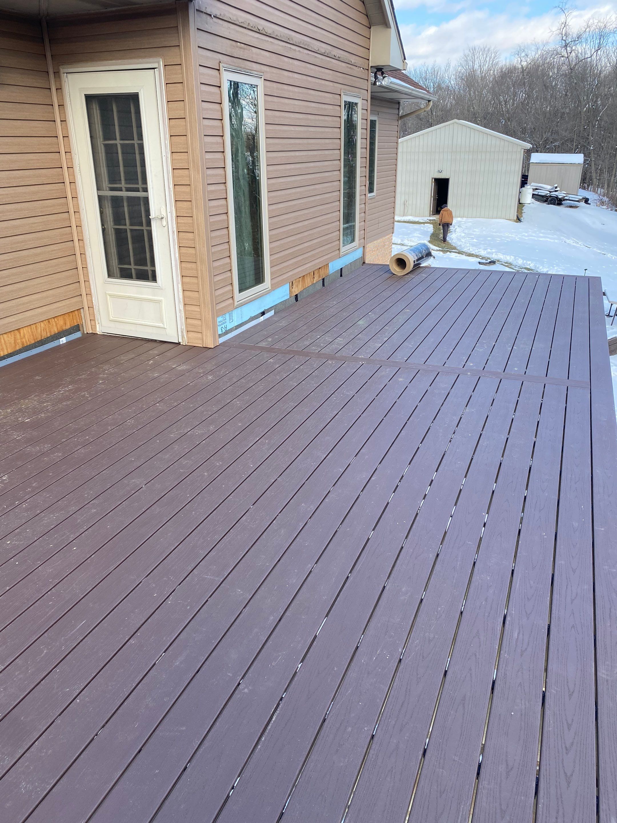 Deck and Roof Build by Cousins Roofing Siding & Decks