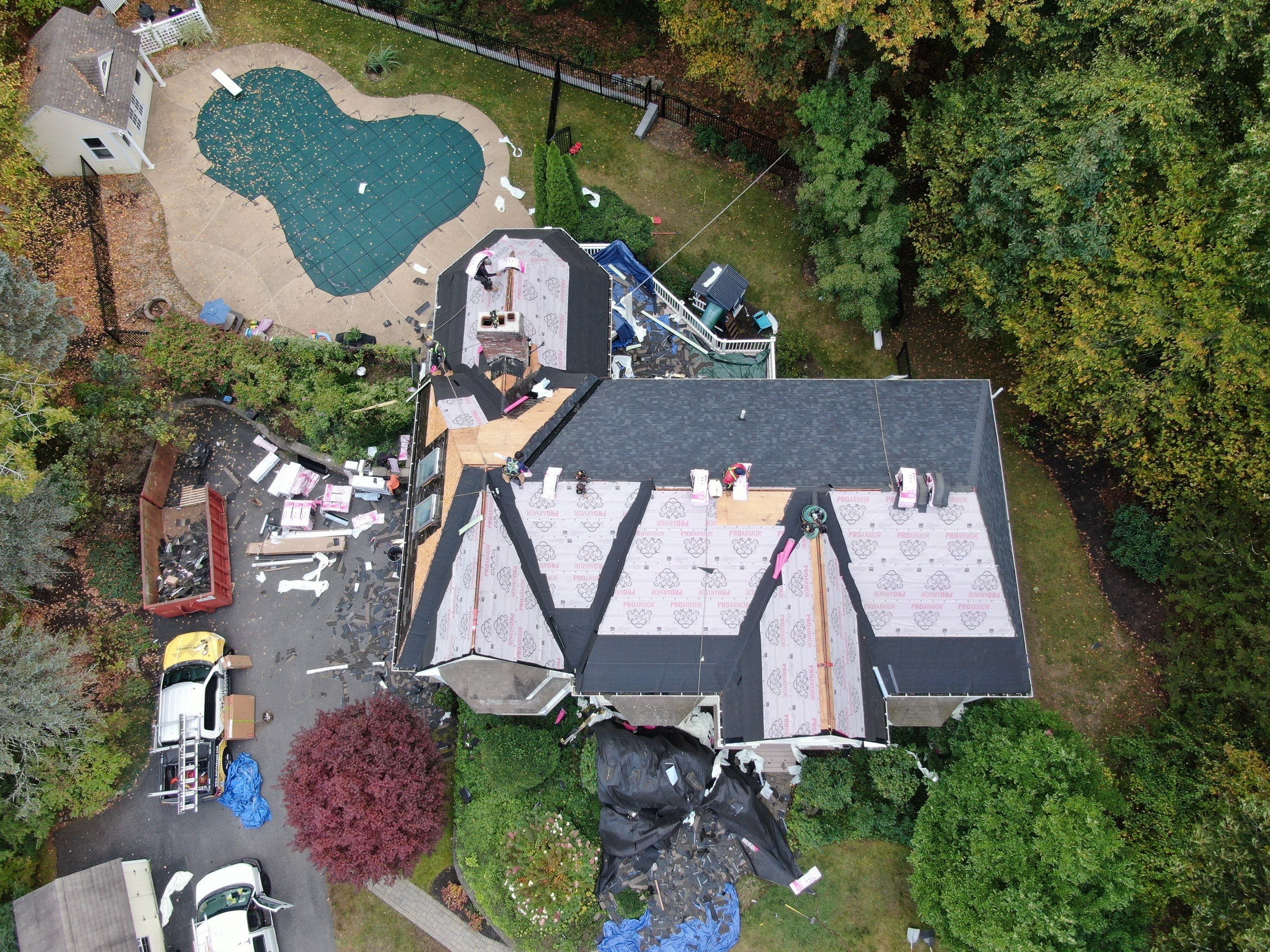 New Roof, Skylights, and Metal Accent Roof Installation in Groton by Mighty Dog Roofing of Greater Middlesex County