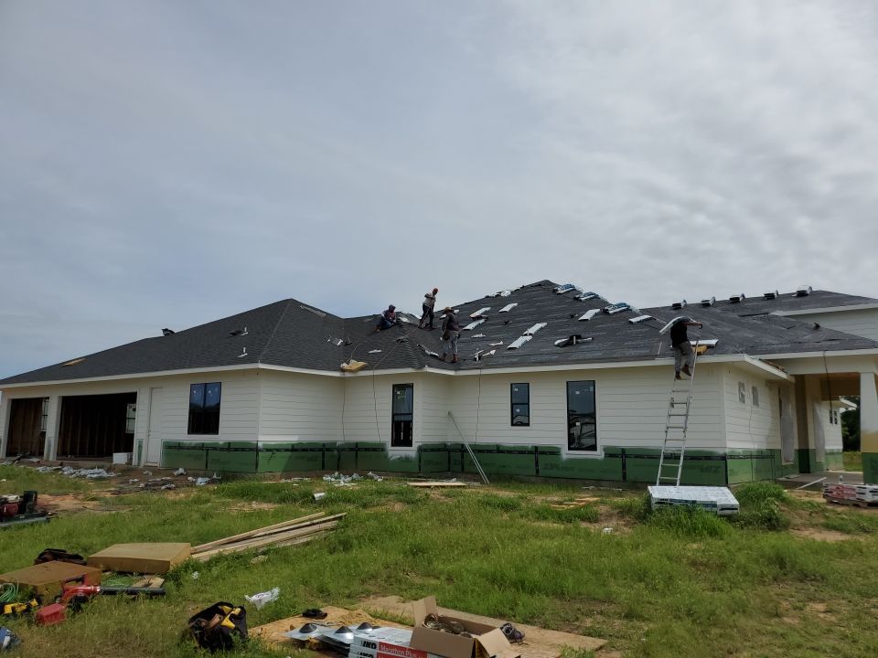 Residential Roofing Installation  by Harvey Roofing & Construction