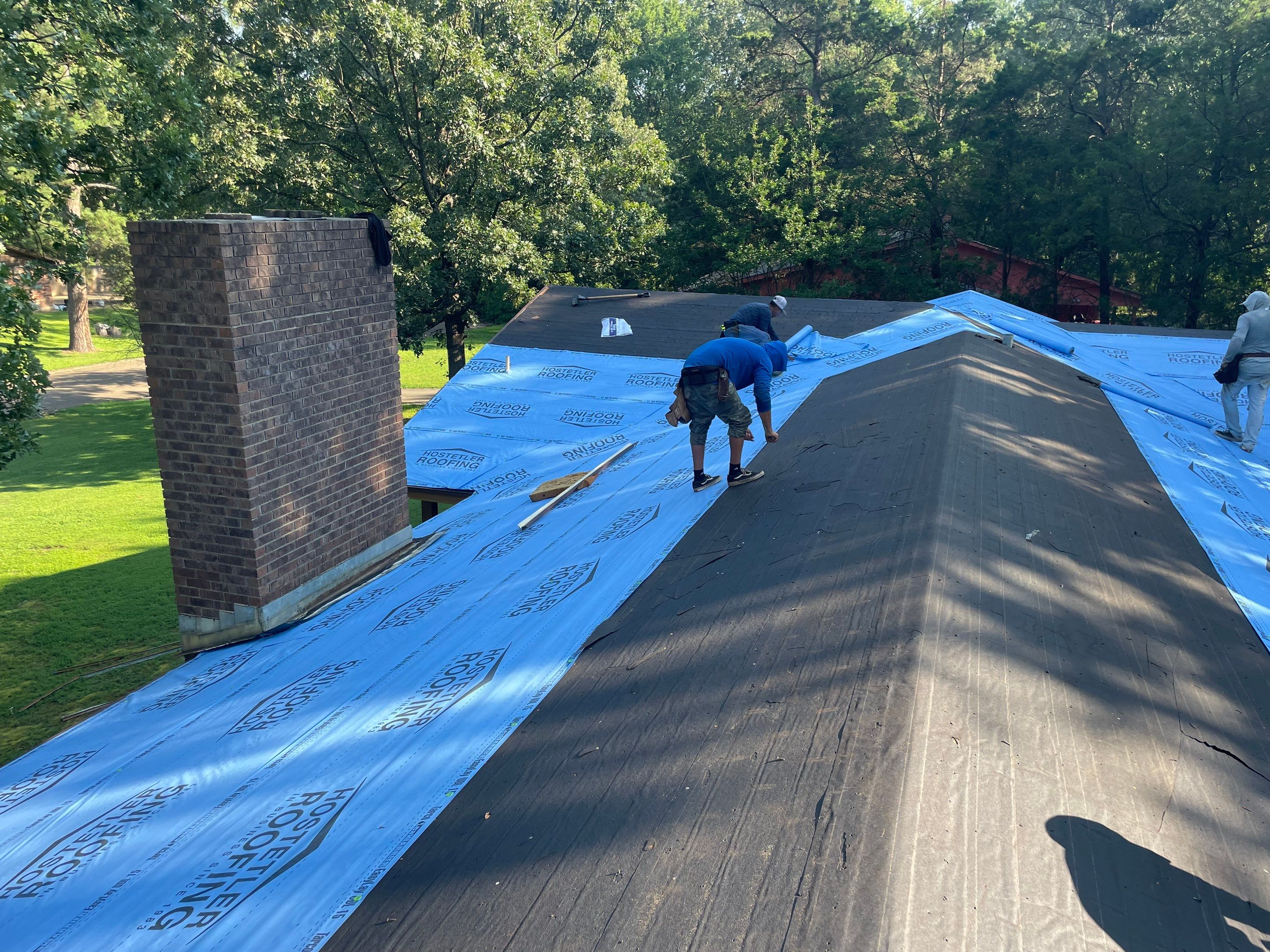 Storm Restoration Reroof: 25 Year 3-Tab Shingle by Hostetler Roofing