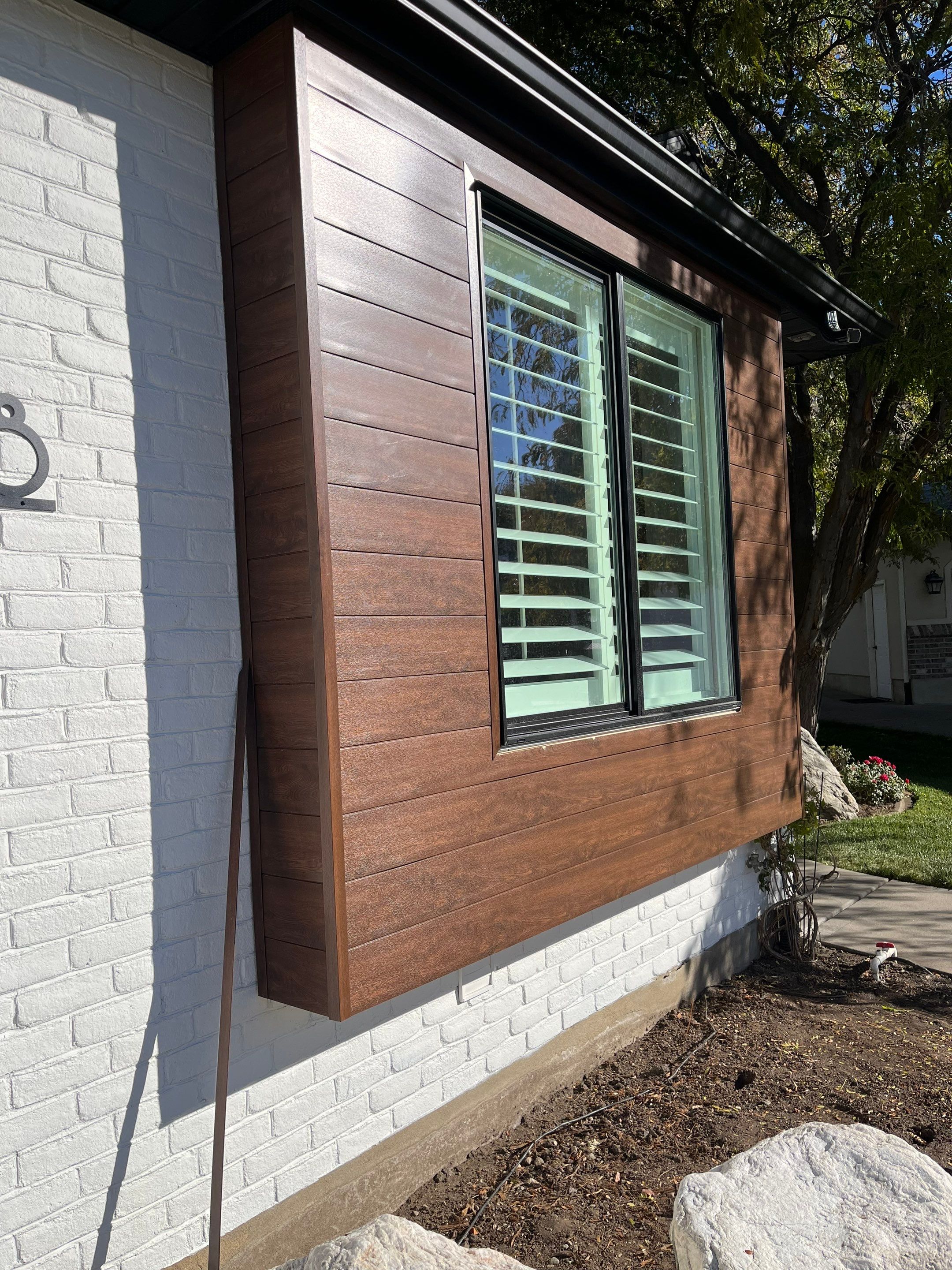 Centerville | High-End Stucco Conversion Accent | Walnut Cedar & Primed B&B by Ideal Siding Utah