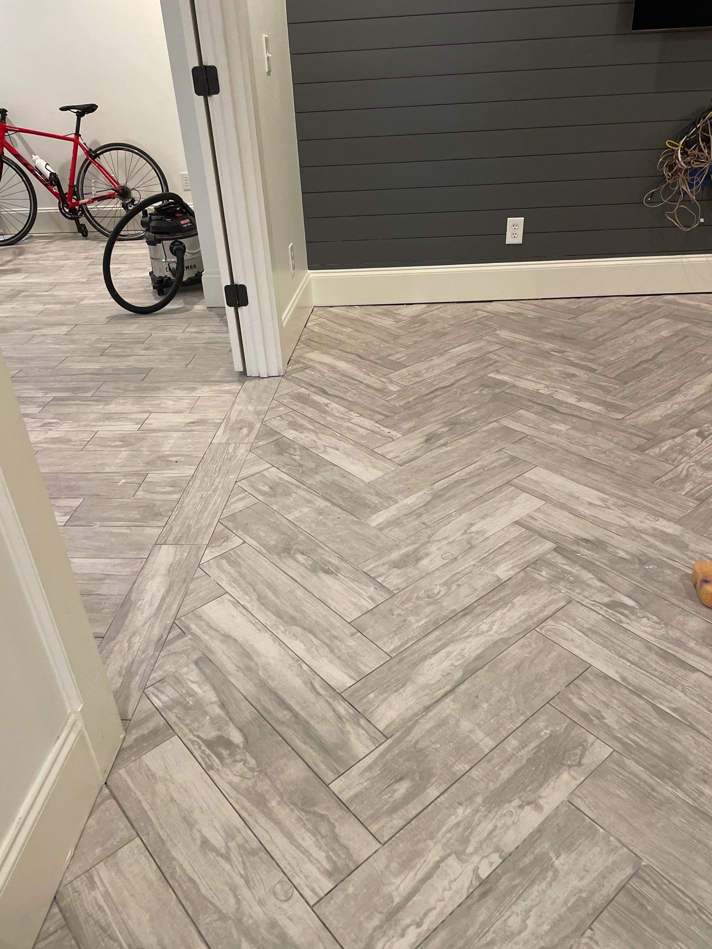 Herringbone and plank tile by Footprints Floors of East Atlanta