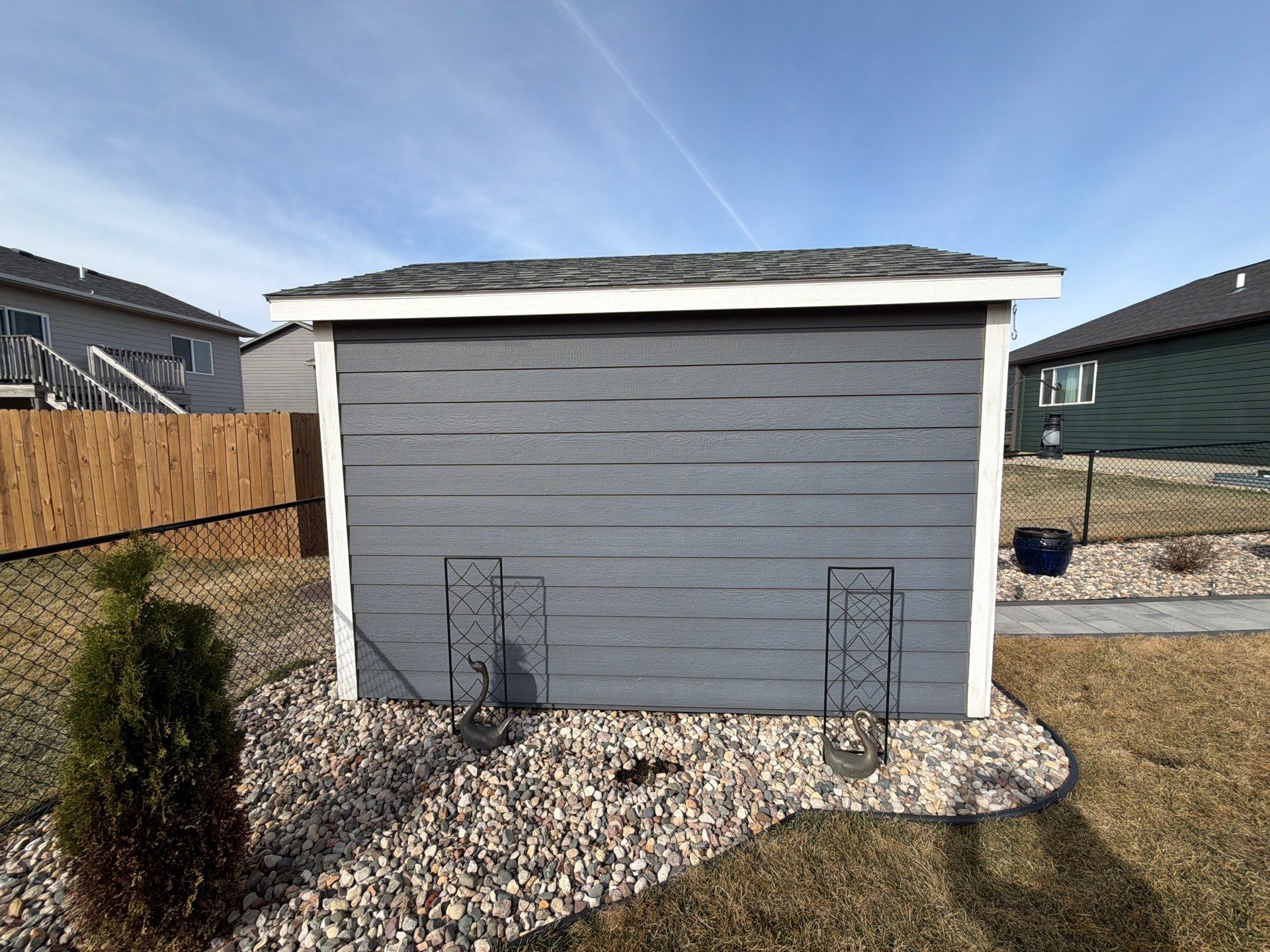 Residential Exterior Painting and Siding Refresh in Sioux Falls by Select Painting, Coatings & Garage Cabinets