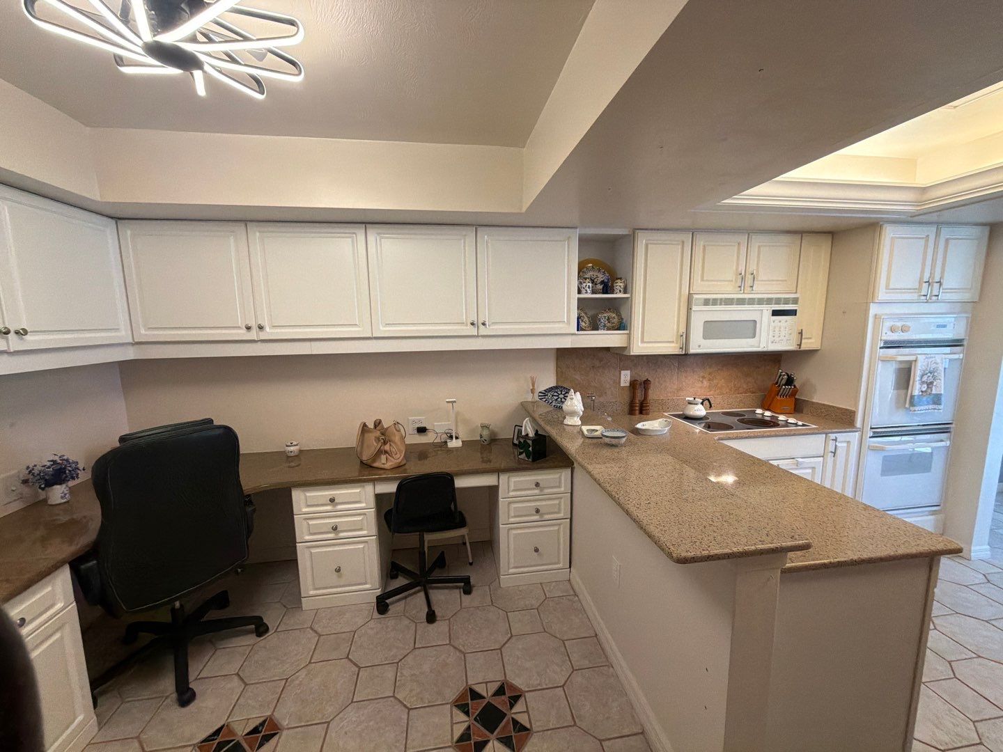 Completely Re-imagined Modern Condominium Kitchen Remodel  by Acies Renovations
