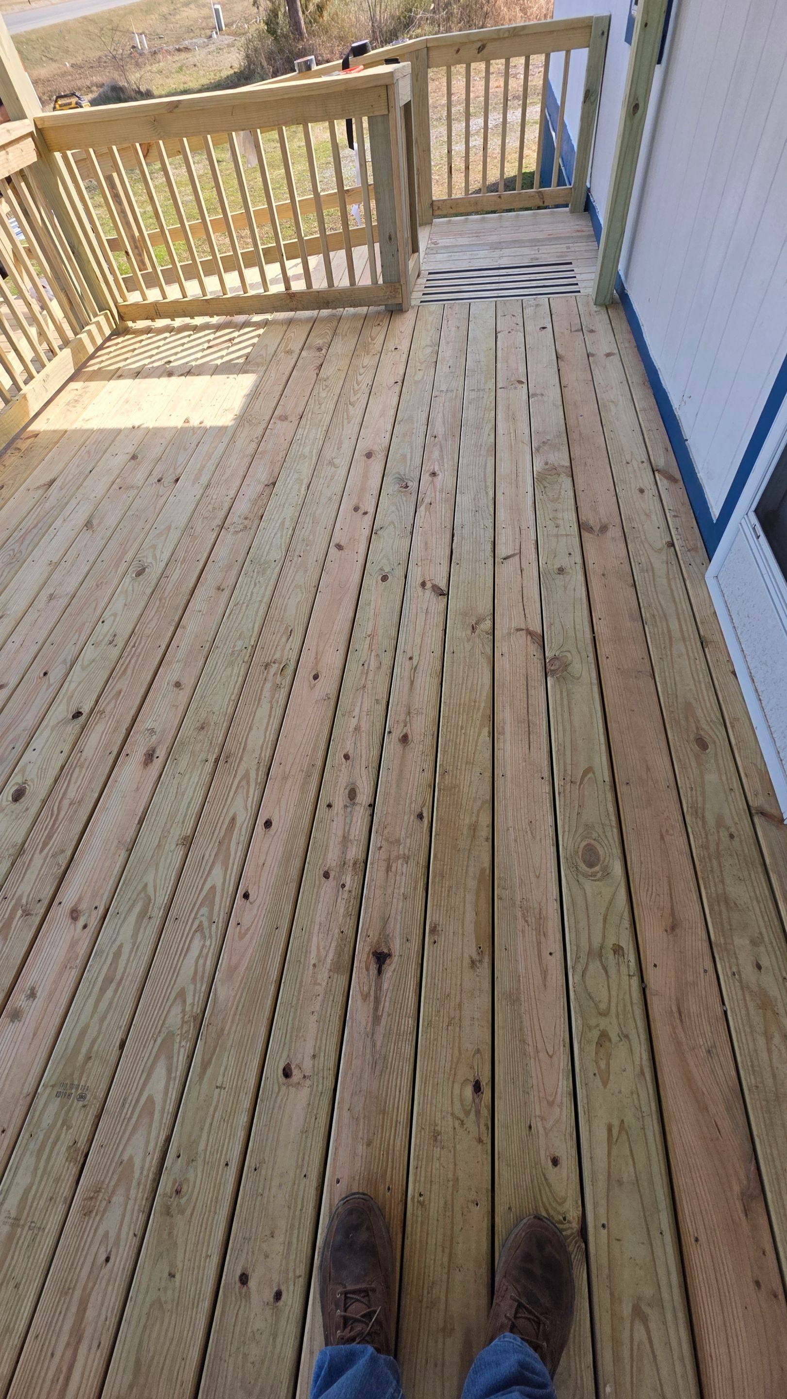 Covered Deck w/ ADA Ramp by In & Out Construction & Remodeling, LLC