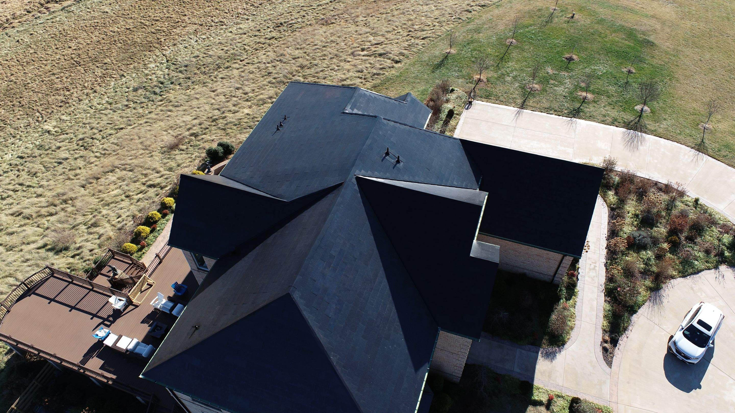 Tesla Solar Roof Replacement by American Home Contractors