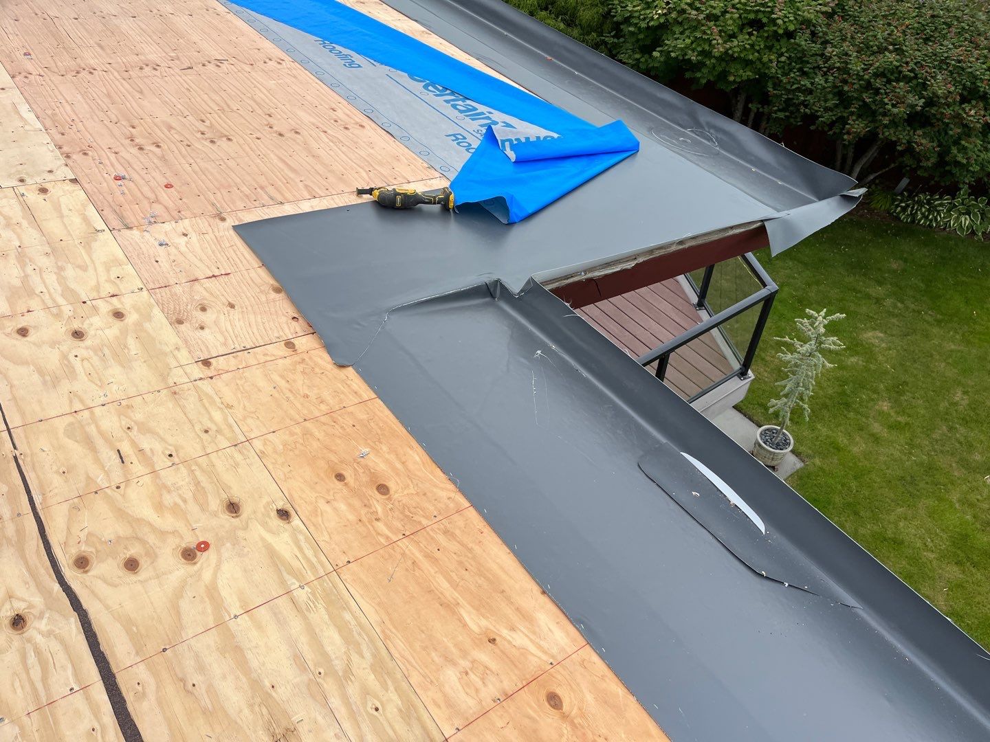Low Slope Shingles to Metal with Built in Gutters by Roof Smart